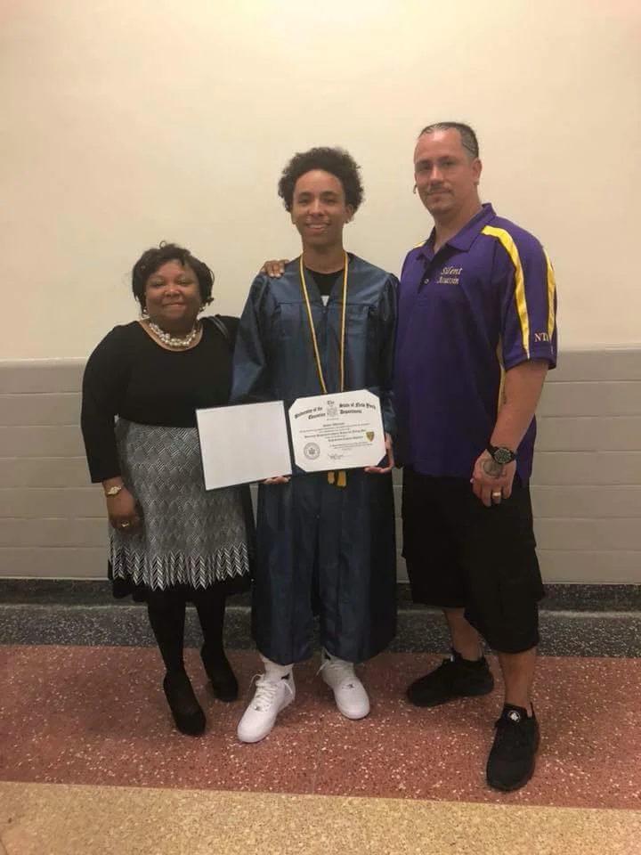 The graduate and his proud parents!