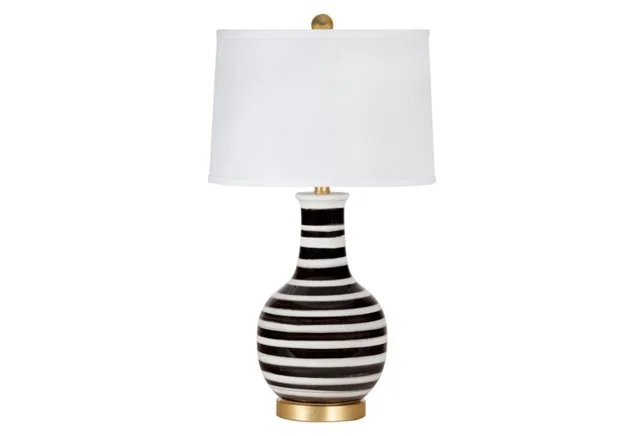 A lamp from OKL that is sure to be a show stopper and give your space a little something special. Don't be bashful when accessorizing. Make a statement and let your favorite colors shine!