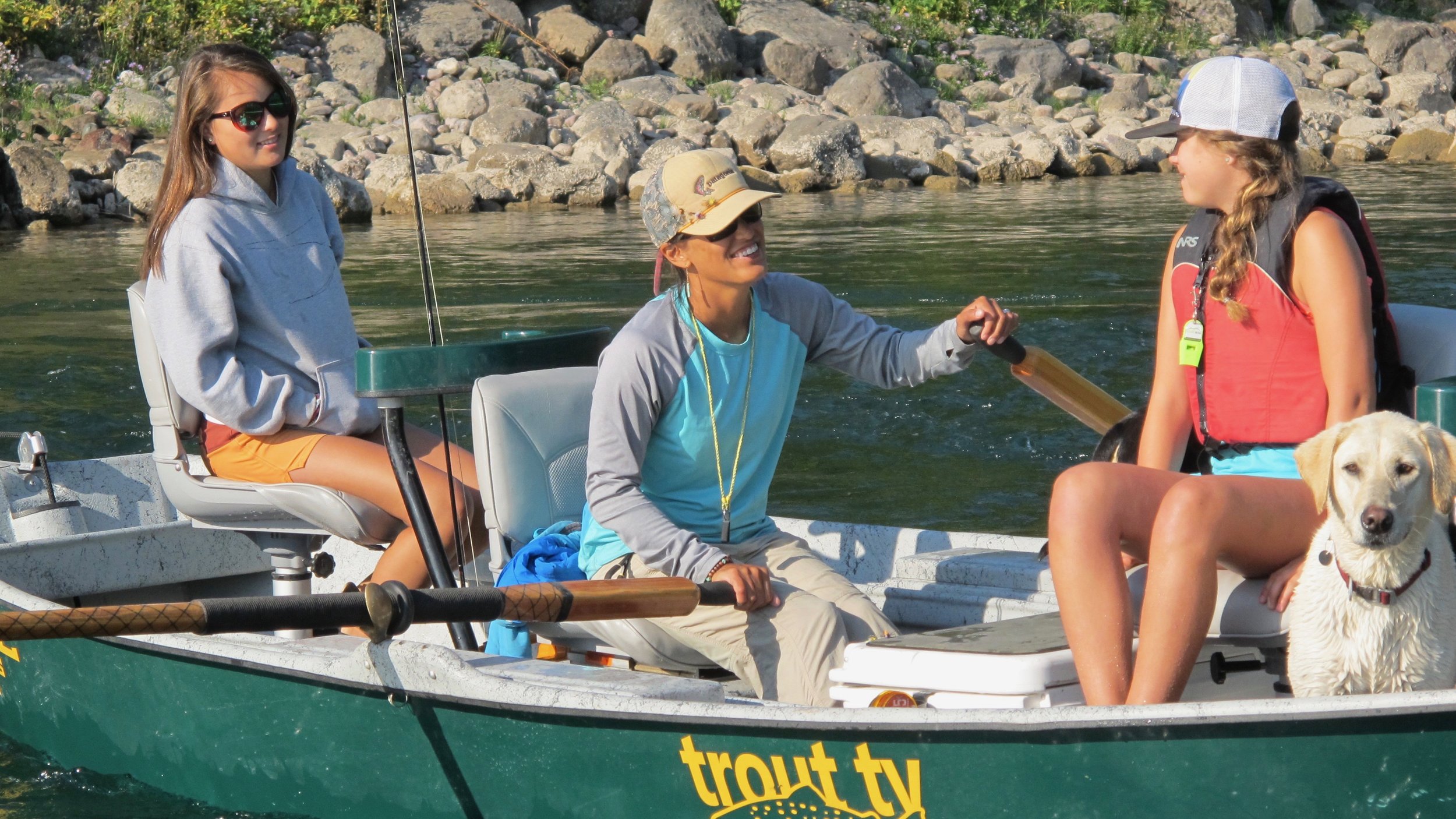 Hilary, Ella & Delaney float Montana's Flathead River.