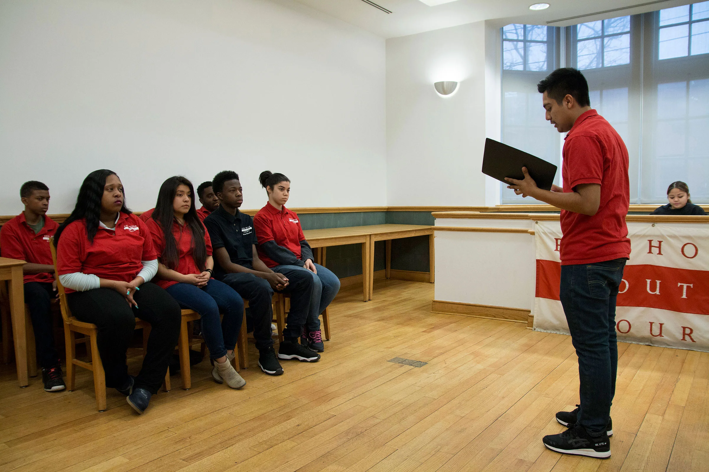  Diego, 16, (right) acts as a Community Advocate. The role requires him to deliver a statement about how the offense committed has affected the community. The youth court is led by the jury, which questions the offender, or as they call them, “respon