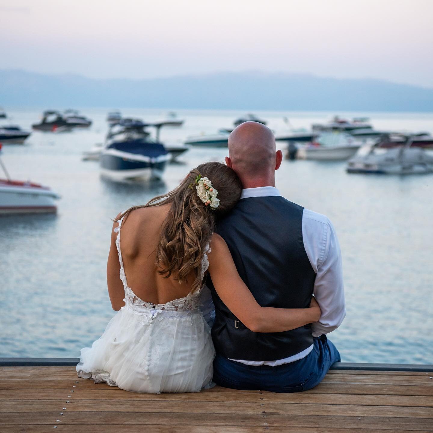 Sitting of the dock of Lake Tahoe 💍 #laketahoewedding #kenvialephotography