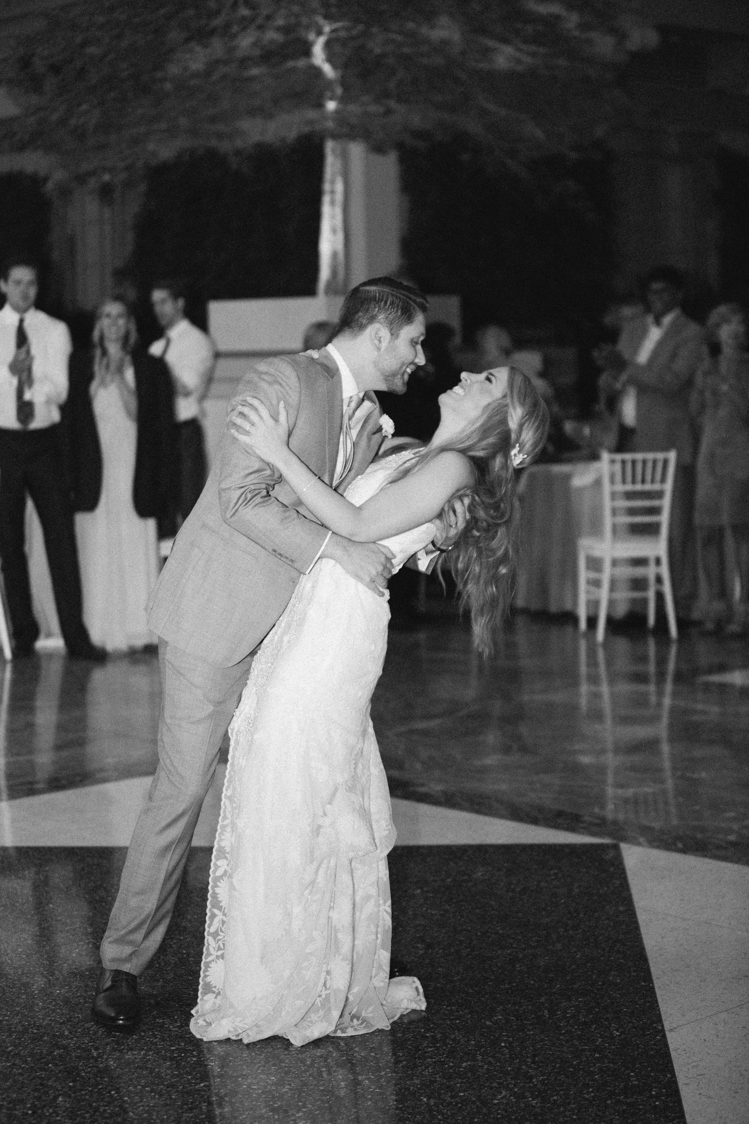 Couple dipping during their first dance at their wedding