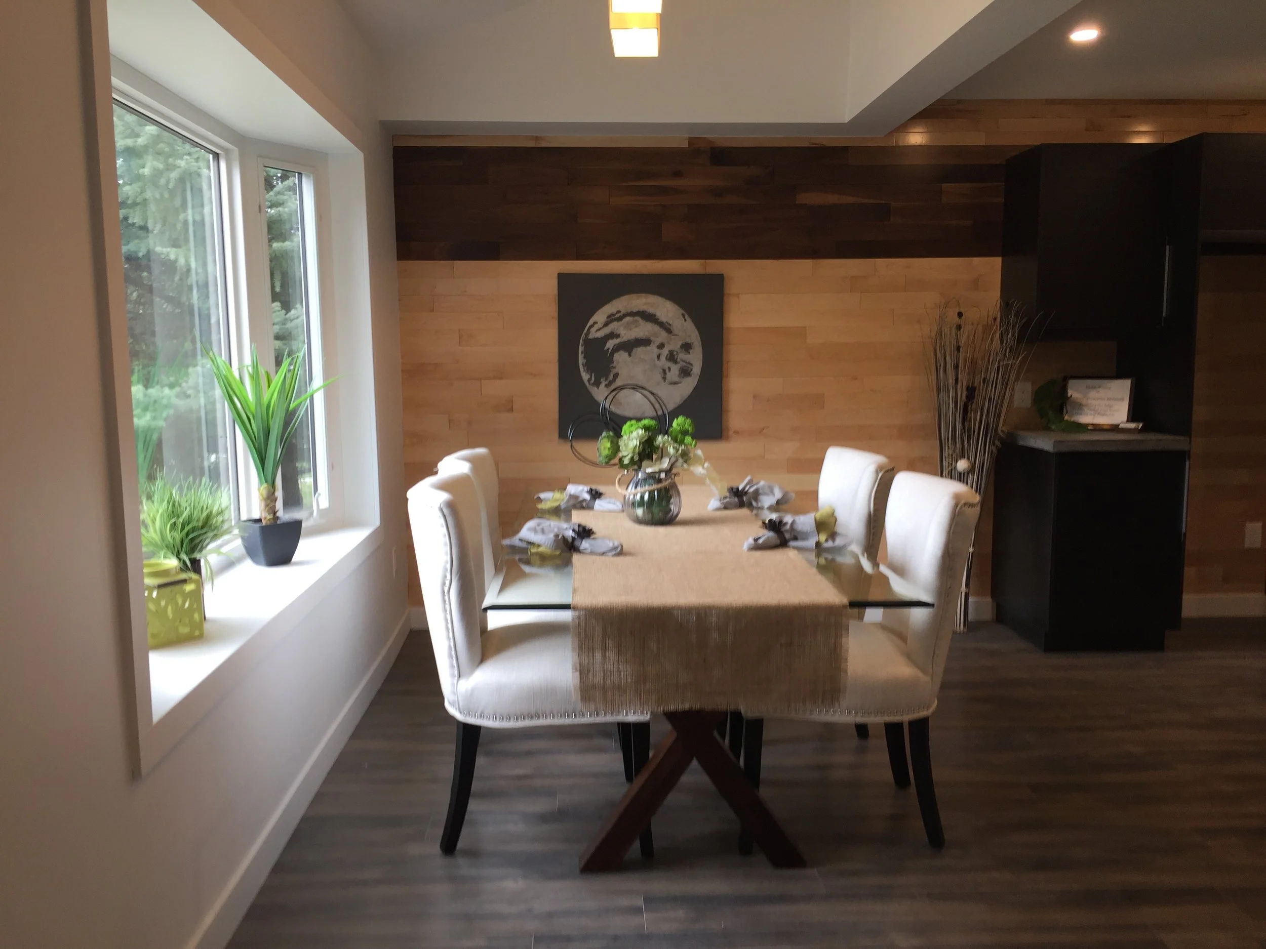 The Dining room is quite spacious for a small house. It is made for entertaining!