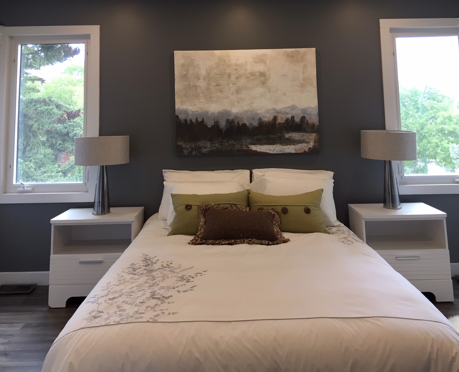 The Master Bedroom is staged with a Queen Size bed, but you can tell it could hold a King Size. I painted the Misty water picture 2 years ago. The colours go well in this room.