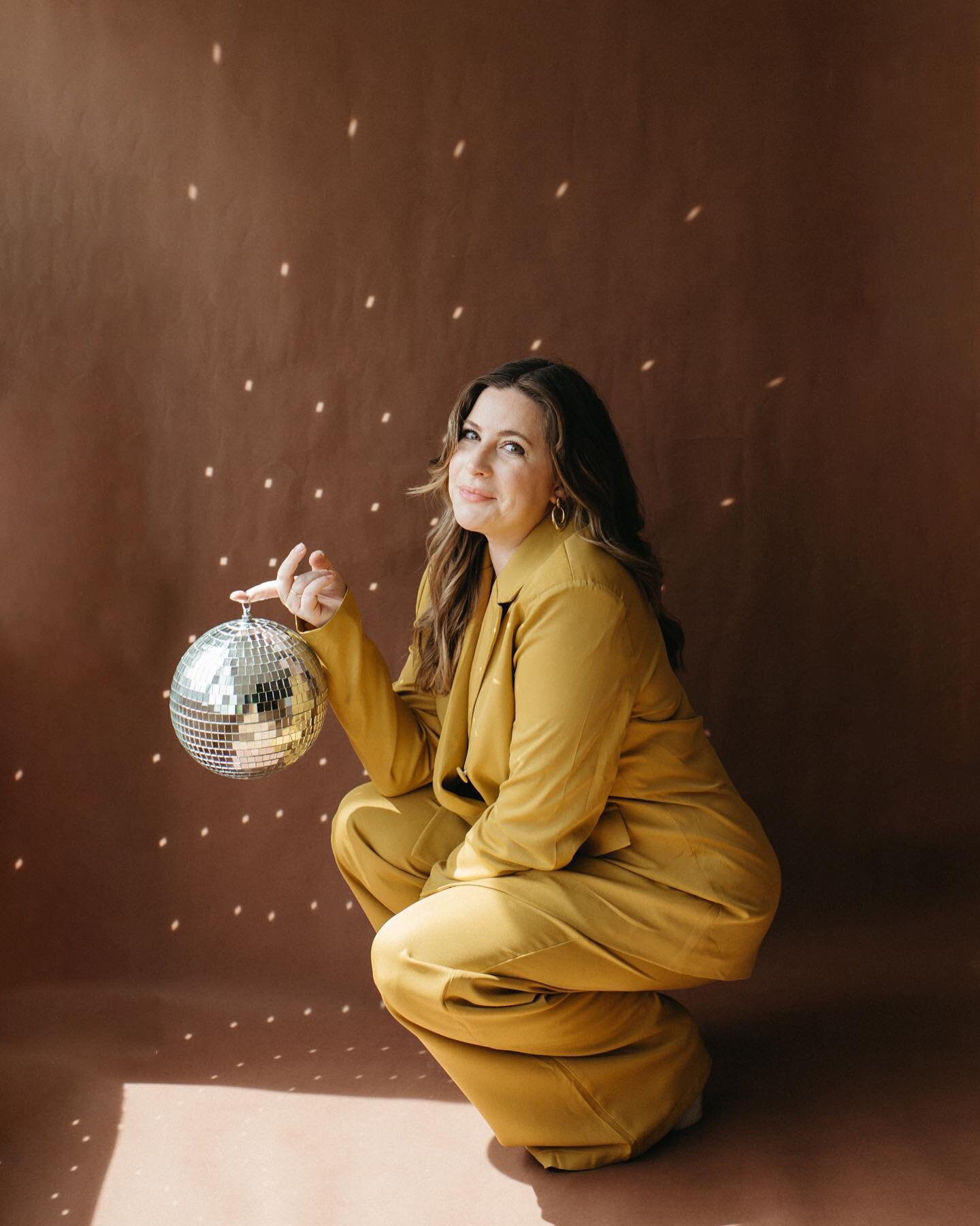 sometimes you just need to add a little sparkle to your day and have a photoshoot in your dining room ✨ #freckledfoxphotography #photobackdrop #paperbackdrop #discoball #sparkle #athome #suit #powersuit #girlboss #arkansas #arkansasphotographer #arka