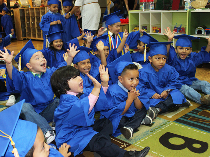 Our preschool students getting ready for graduation and singing some songs! 