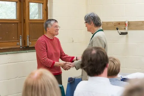 Retiring President Mrs Jane Ing welcomes incoming President Mrs Lesley Mead.