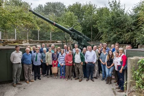Group photo in front of Mudchute's WW2 anti-aircraft gun.