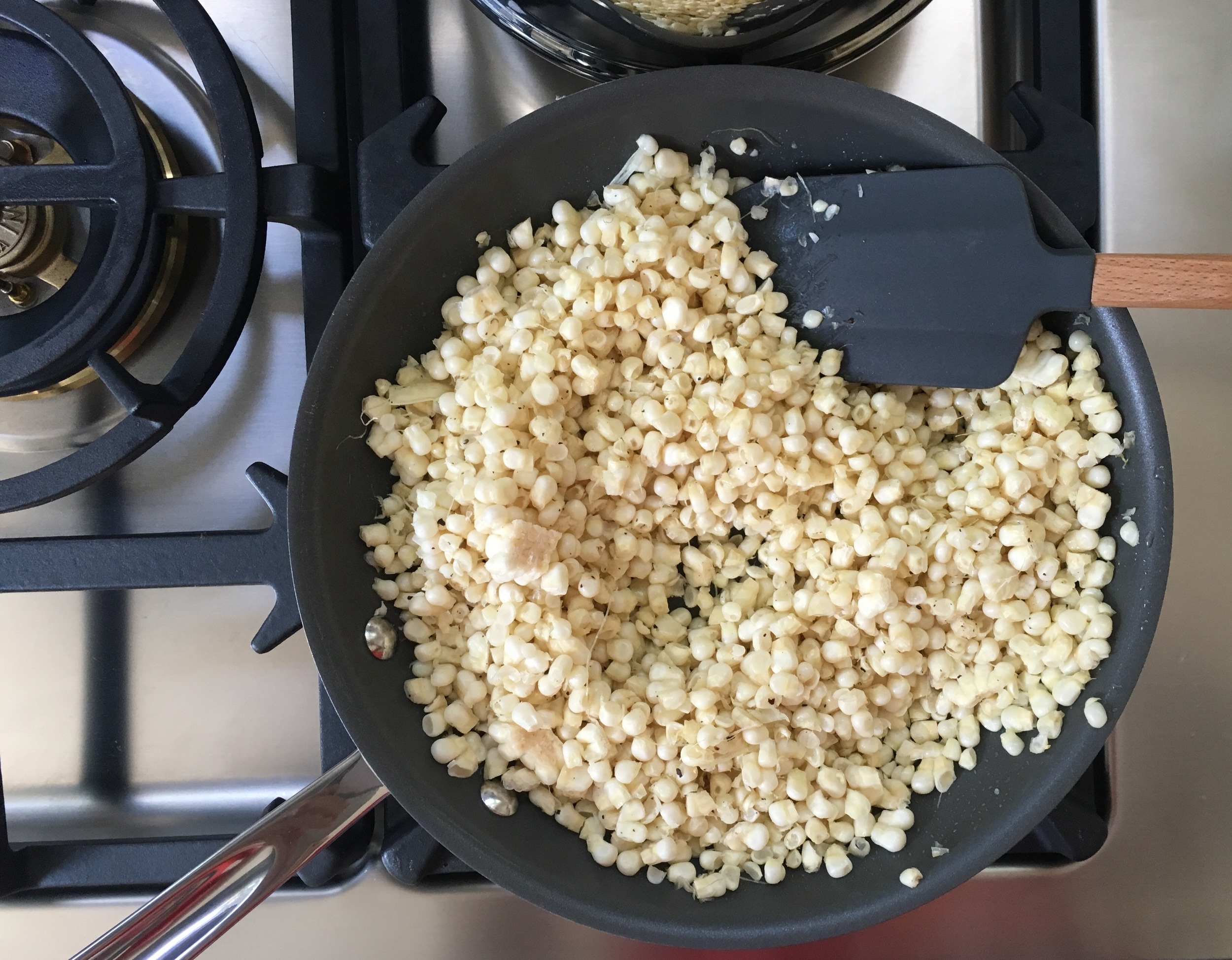 Corn, coconut oil, salt and pepper- you're only step of "cooking" in this recipe!
