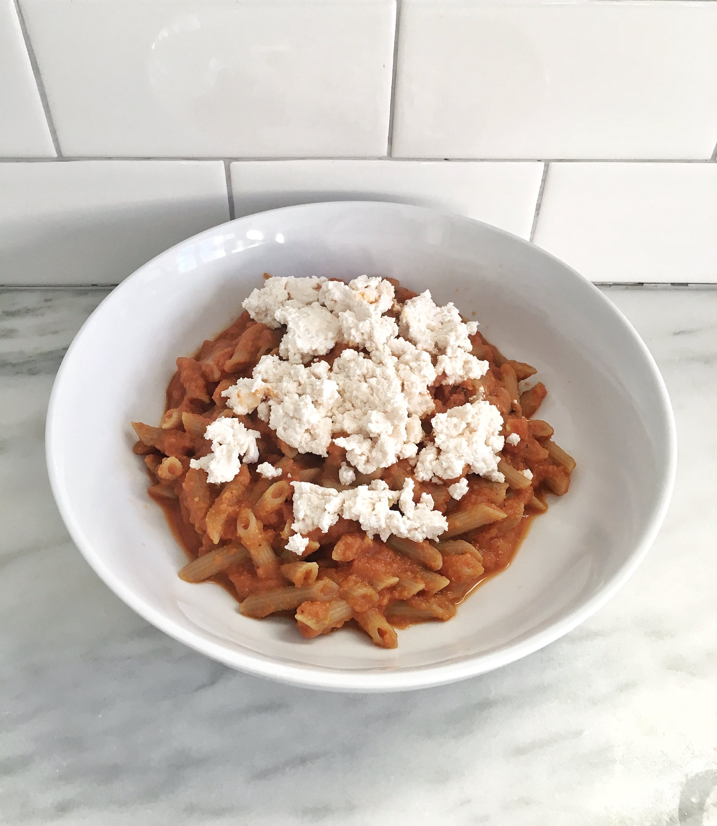 For a vegan and gluten free meal, top quinoa/brown rice pasta with sauce and Kite Hill almond milk ricotta