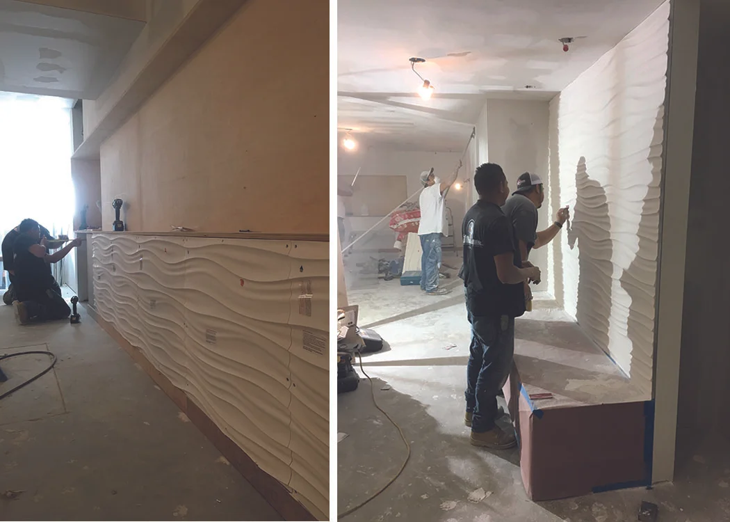 Construction crew installing the Modular Arts panels.
