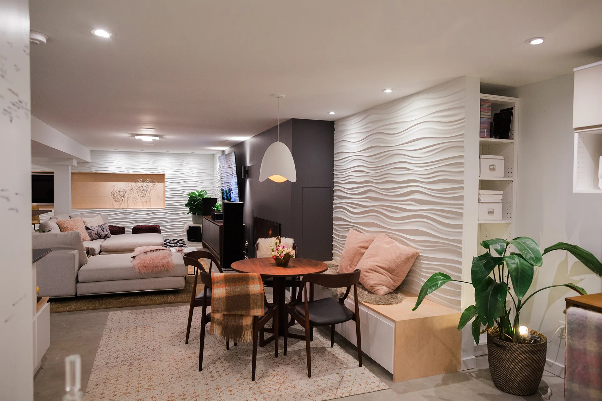 Modular Arts walls flank the fireplace and TV wall, and provide contrast both in color and texture. {Photography by Olga Polo Photography}