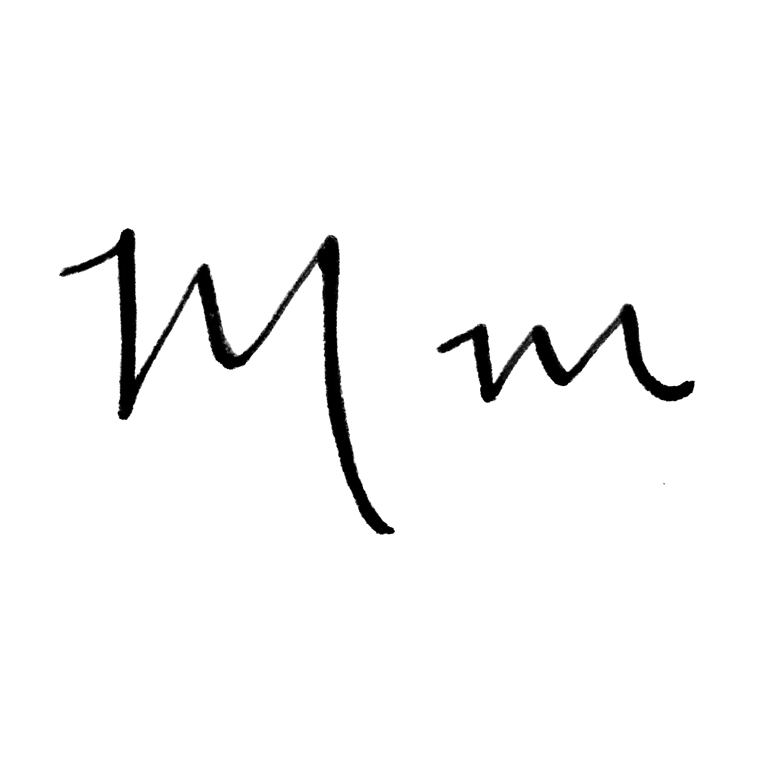 Hand lettered M's with thickened downstrokes give the appearance of being written in calligraphy.