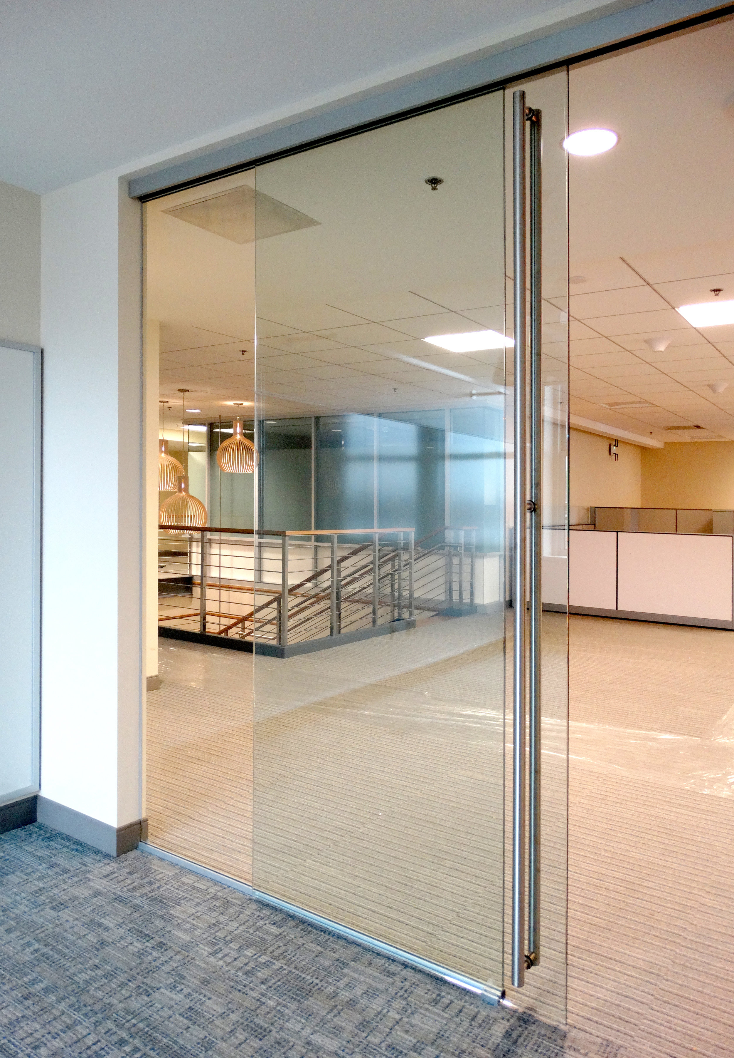 Encase Frameless Glass Sliding Door Office Wall - Spaceworks AI.jpg