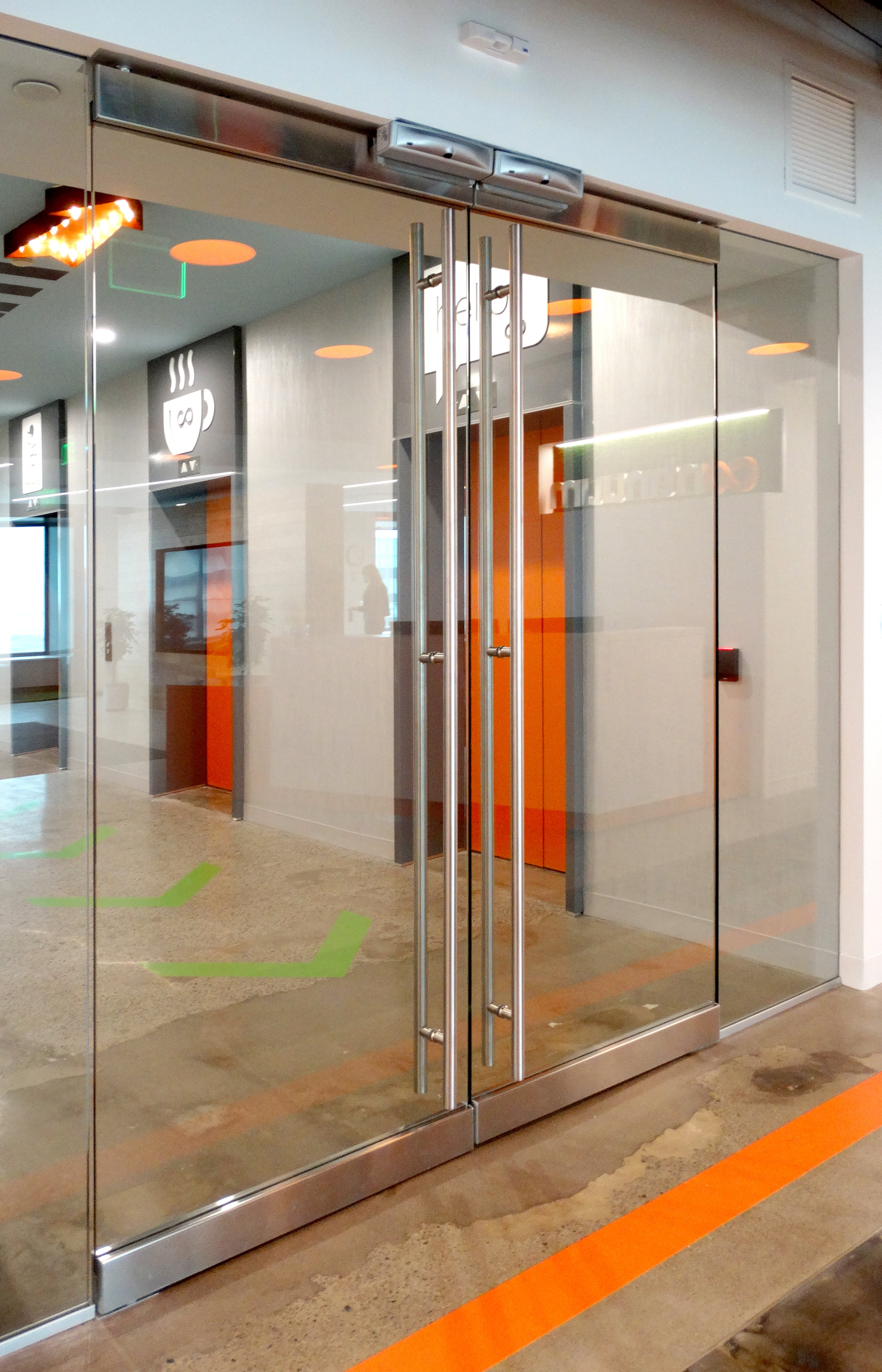 Illume Elevator Lobby Frameless Entry Double Door - Spaceworks AI.jpg