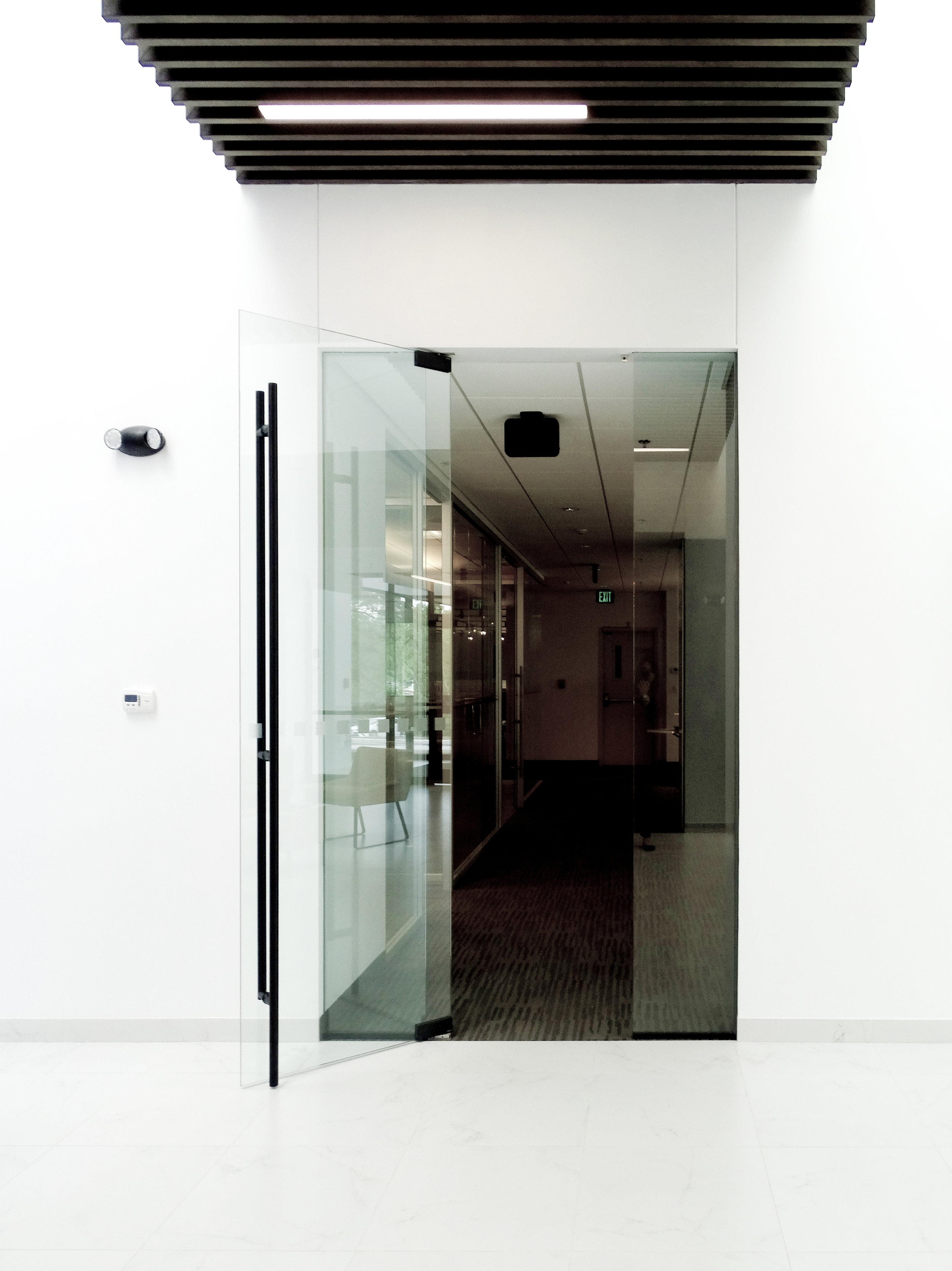 Illume Frameless Door ADA Ladder Pull - Spaceworks AI.JPG