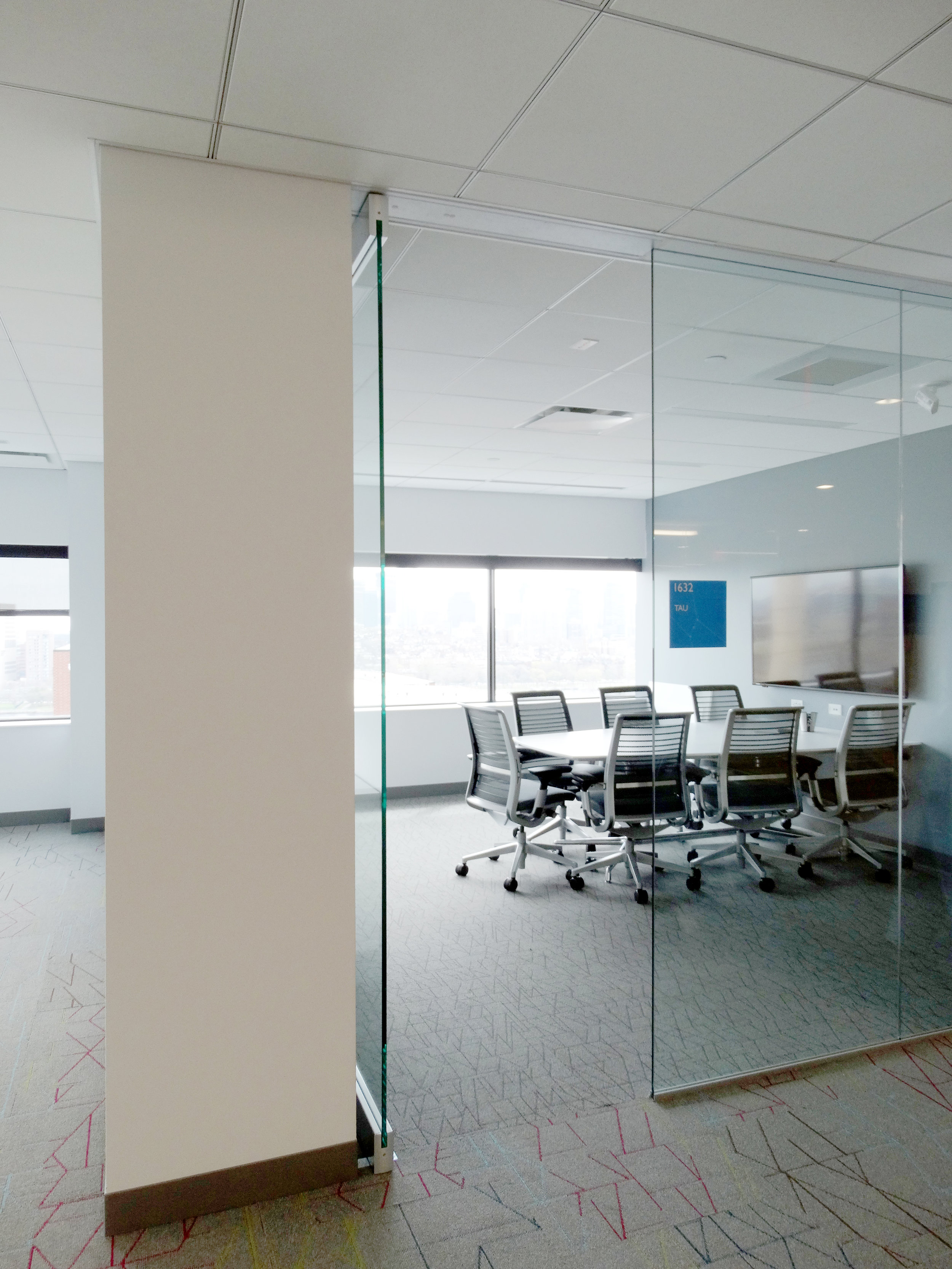 Illume Frameless Glass Conference Room Door - Spaceworks AI.jpg