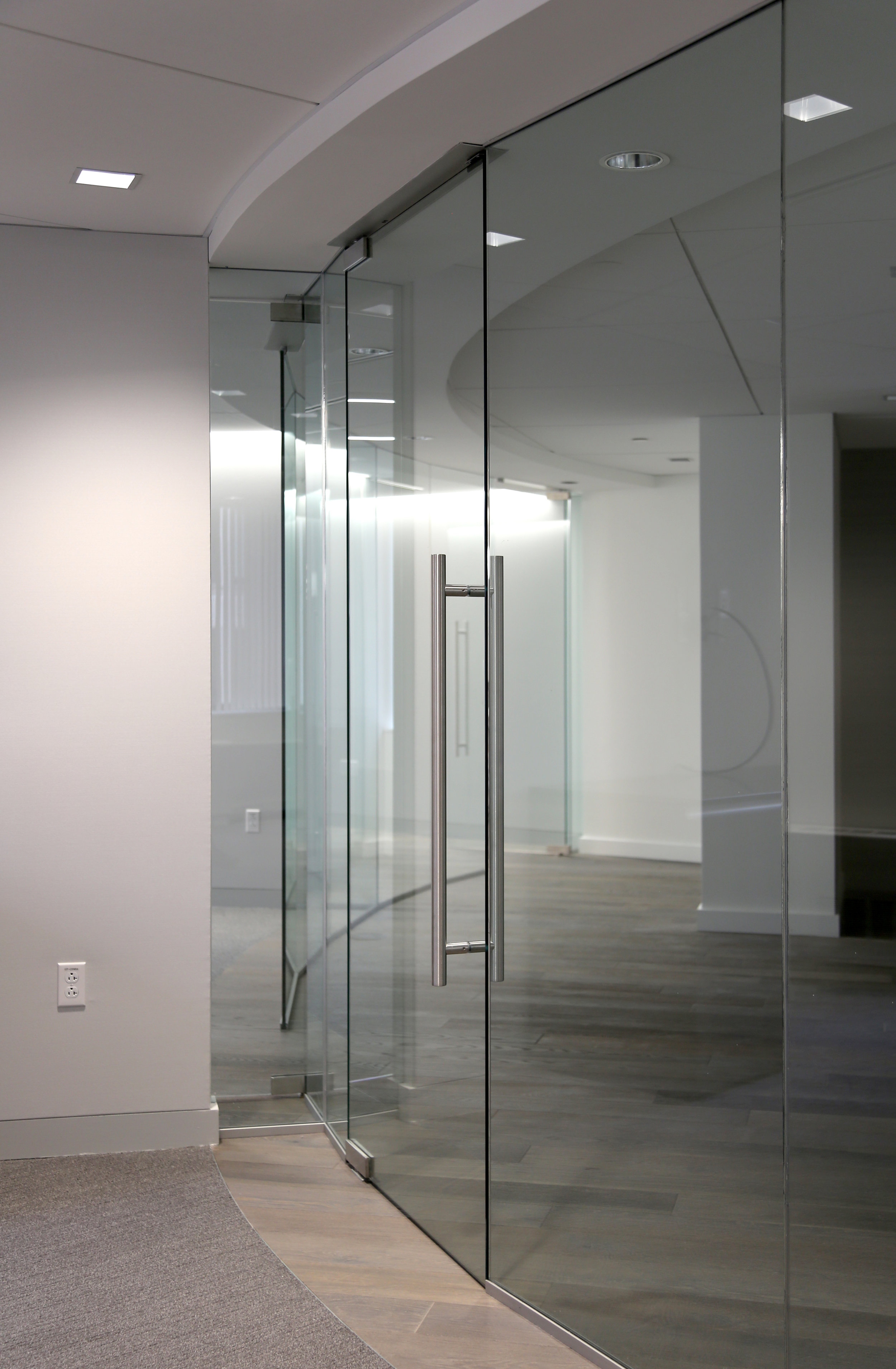 Illume Frameless Glass Curved Return - Spaceworks AI.jpg