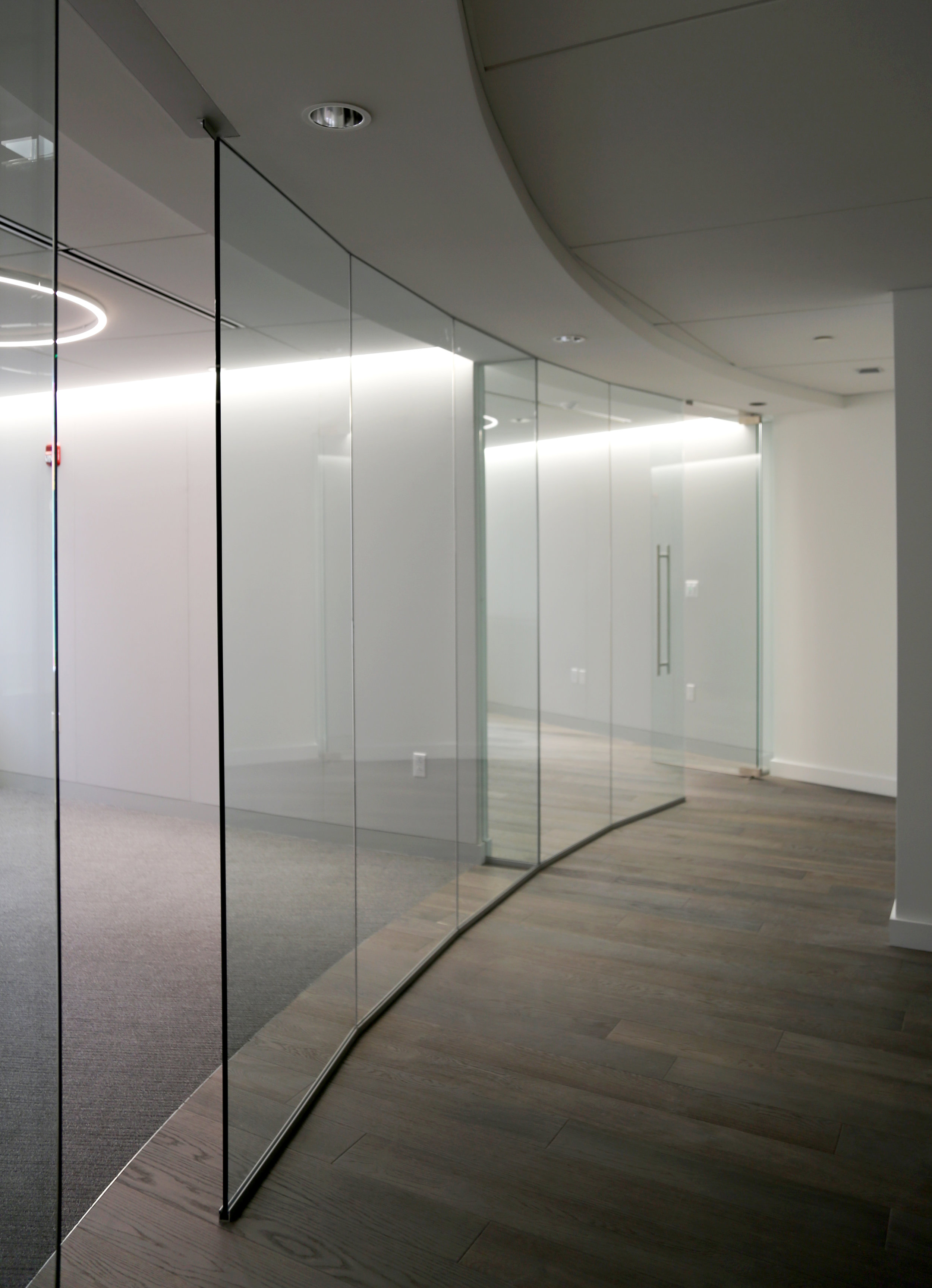 Illume Frameless Glass Faceted Wall - Spaceworks AI.jpg