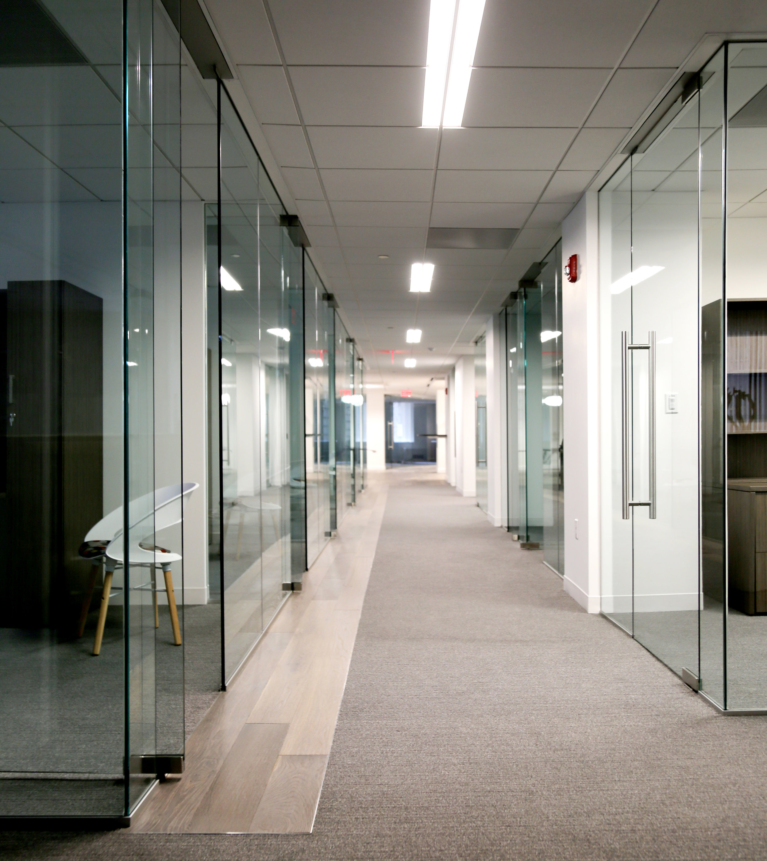 Illume Frameless Glass Office Hallway - Spaceworks AI.jpg