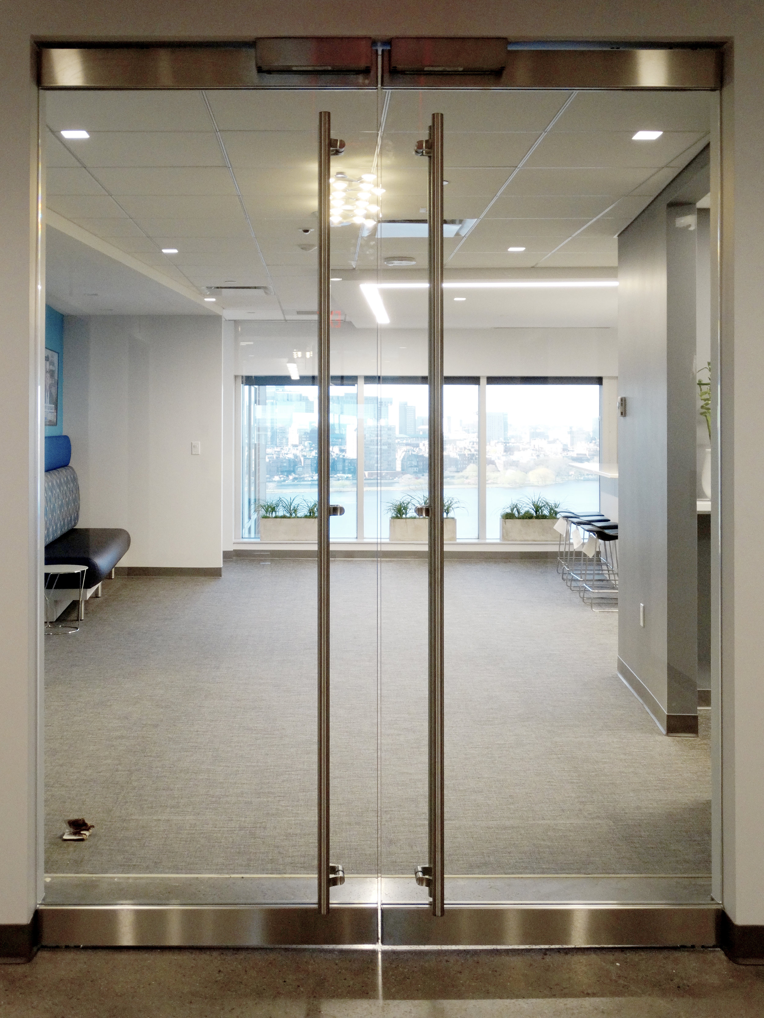 Illume Frameless Glass Rail Doors Offset Ladder Pulls Maglock - Spaceworks AI.jpg