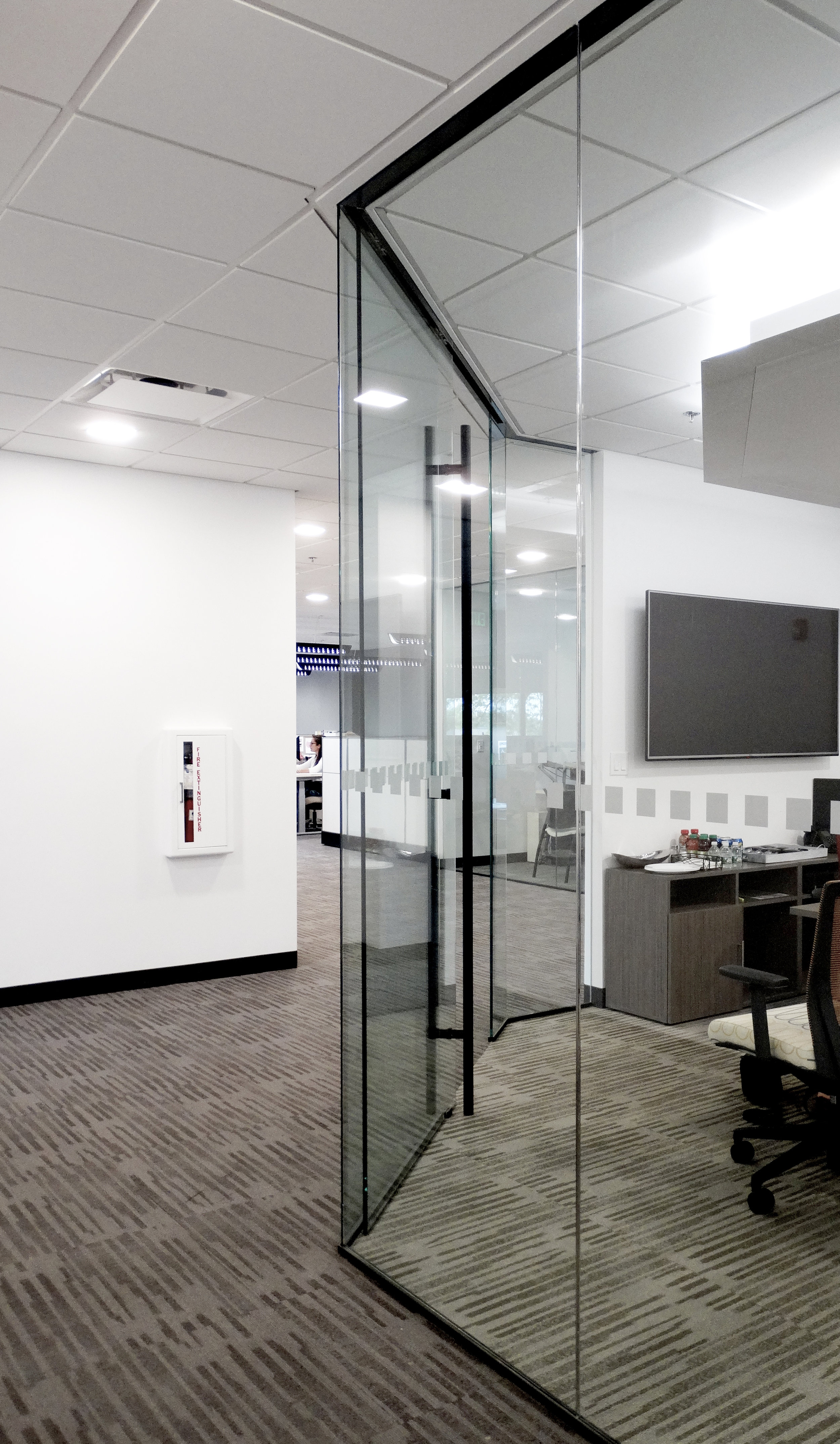 Illume Frameless Glass Sliding Door Office Wall - Spaceworks AI.JPG