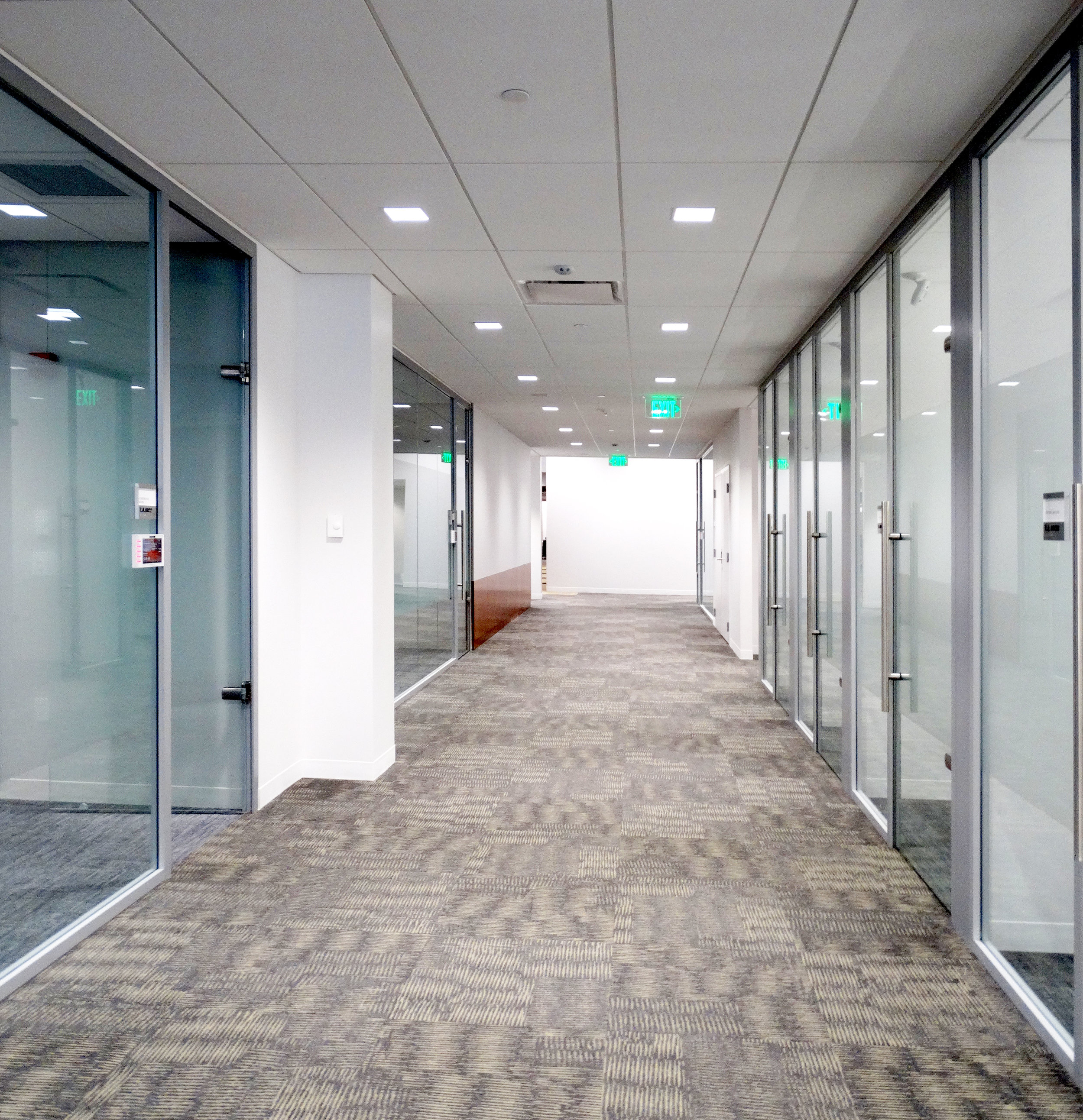 Litespace Frameless Glass Sliding Door Office Hallway - Spaceworks AI.jpg