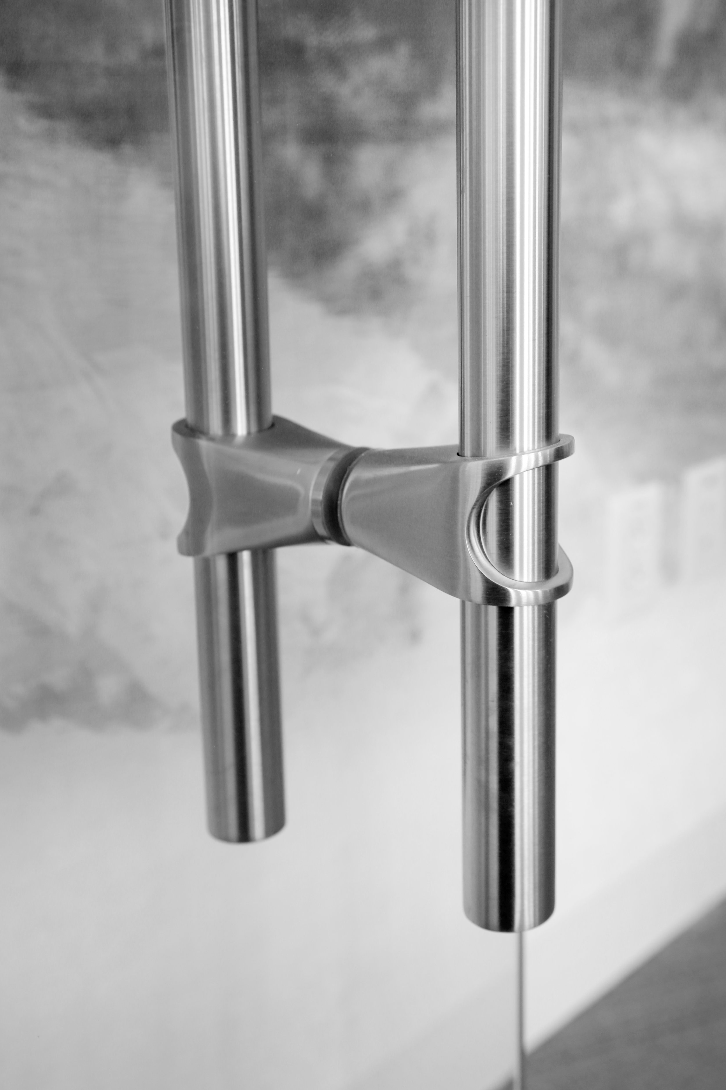 Frameless Glass Door Ladder Pull Custom Posts Straight Pull - Spaceworks AI.jpg