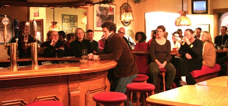 Keith Klassen as Randy, surrounded by the audience in Paupers Pub.
