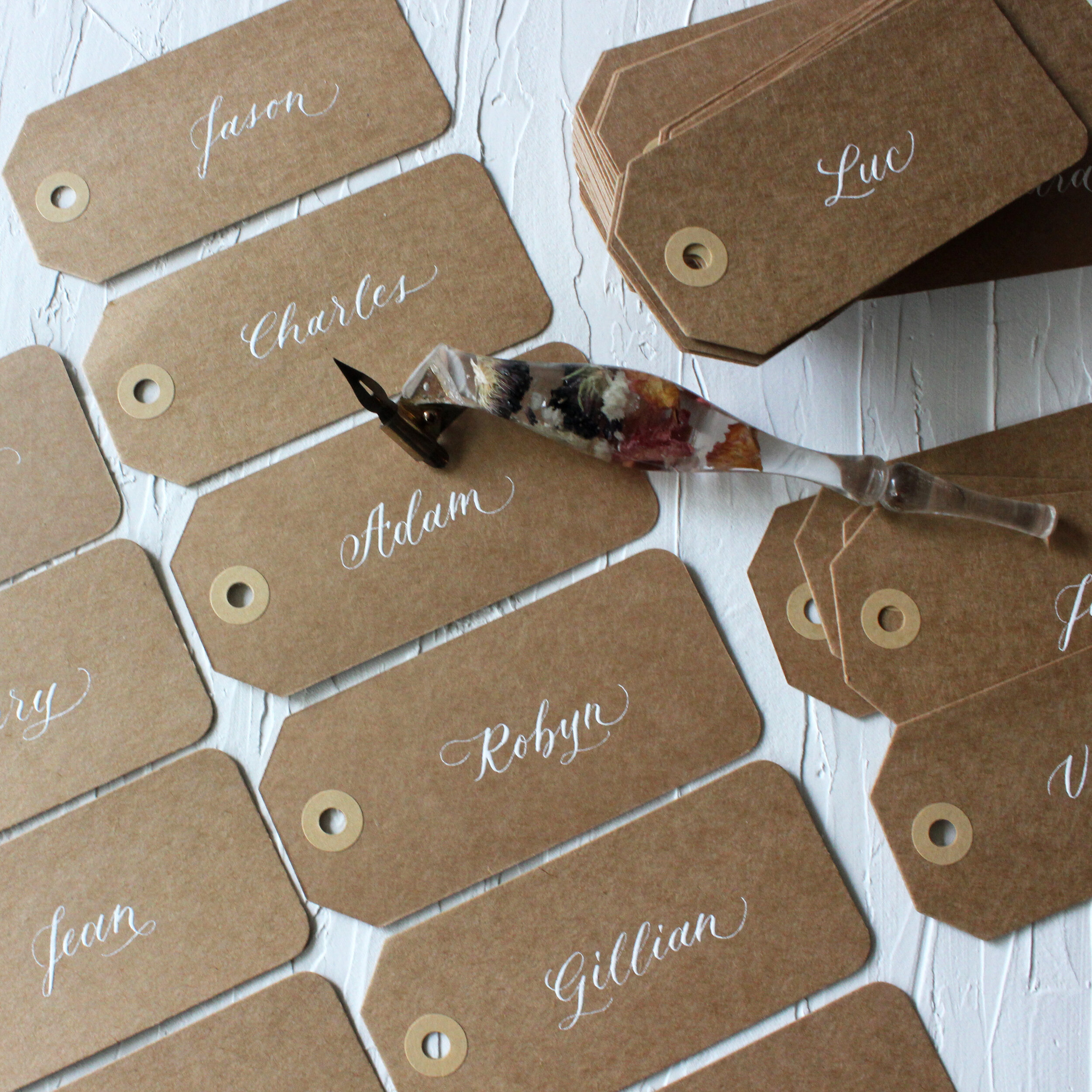 Custom calligraphy name tags for wedding guests