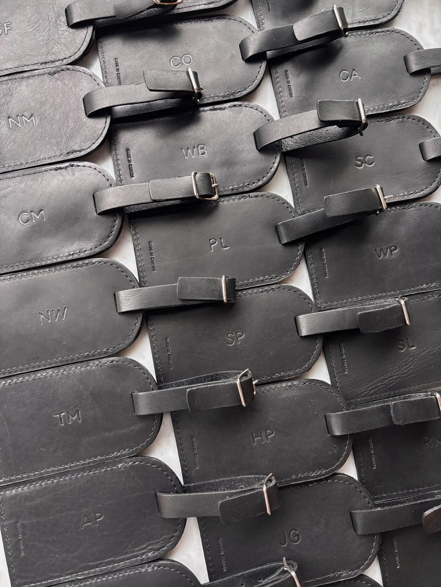 Adding a touch of warmth to @m0851official leather - each luggage tag and pouch hand-monogrammed with heat and pressure ✨ Subtle, personal, and made to last a lifetime 🧳🔥

Thank you to @wla_events for collaborating with me!

#gracesongcalligraphy #