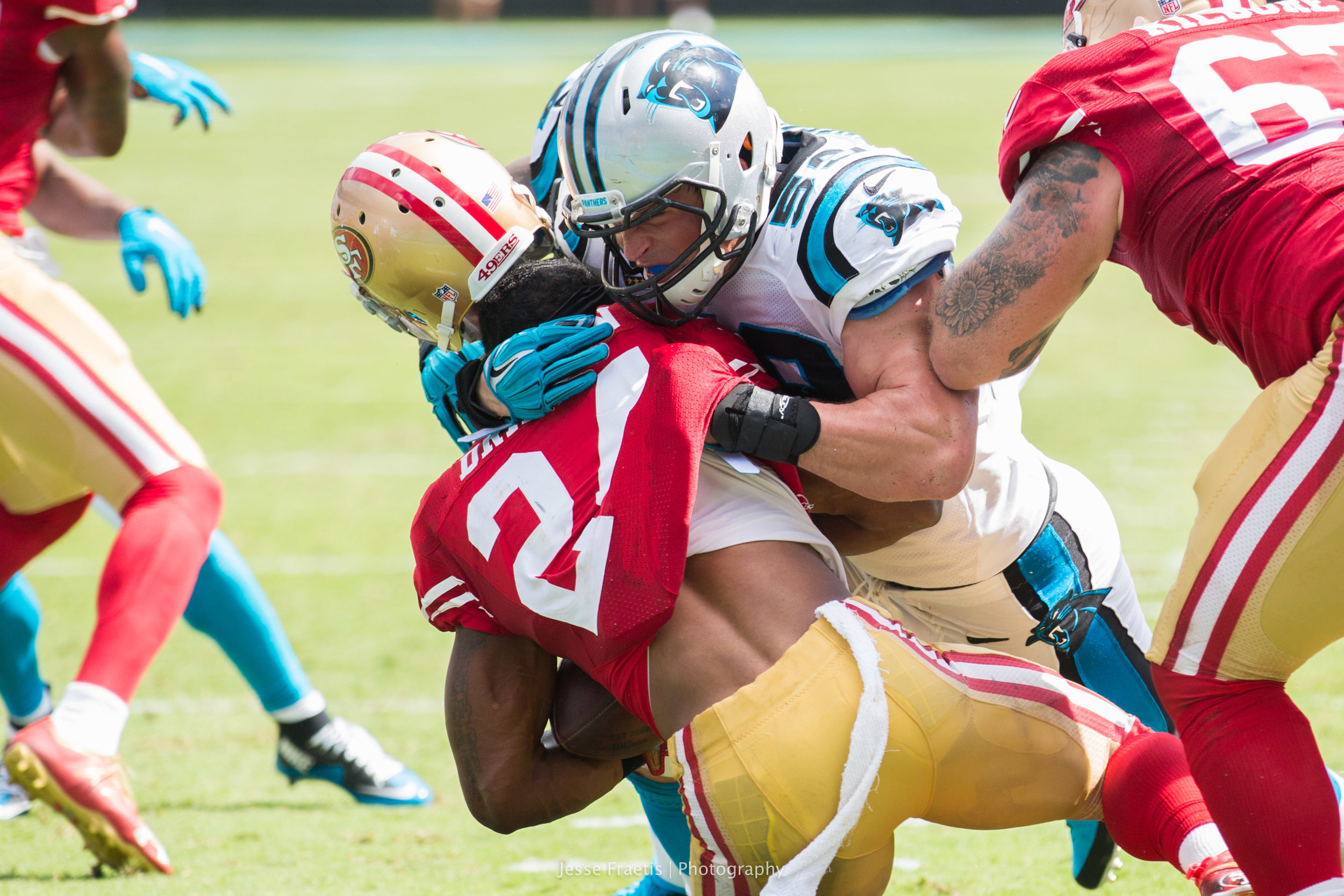 LB Luke Kuechly stopping a crucial 3rd down run