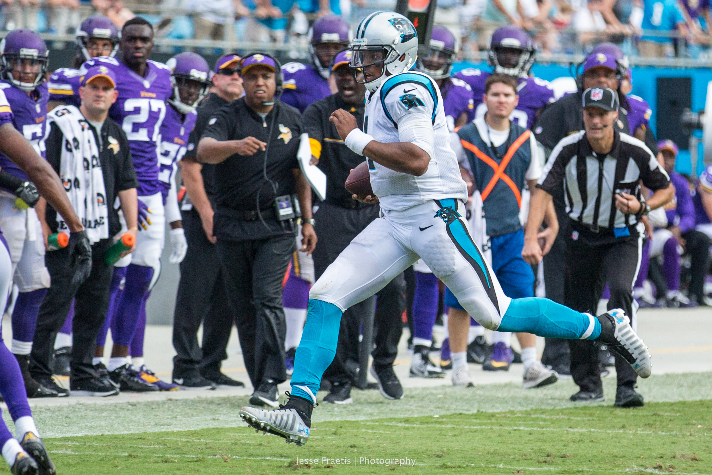 Cam Newton escaping what would have been yet another sack.