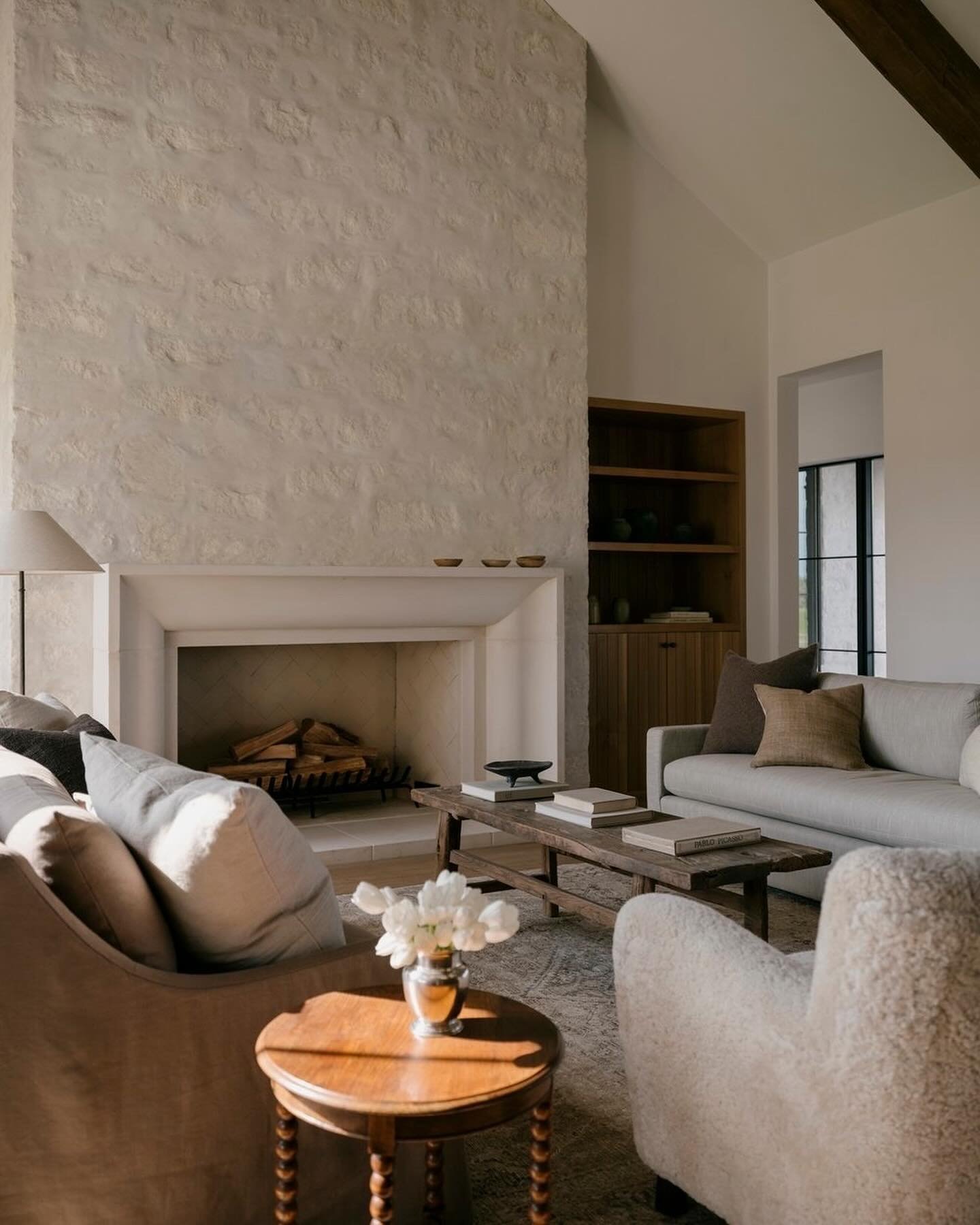 A room so grandeur, it has 20+ feet of cieling height. How did we warm up this space? By filling it with emotionally charged peices and mixing vintage (as always). Did you know we have a 50/50 initiative with each of our projects to source 50% &ldquo