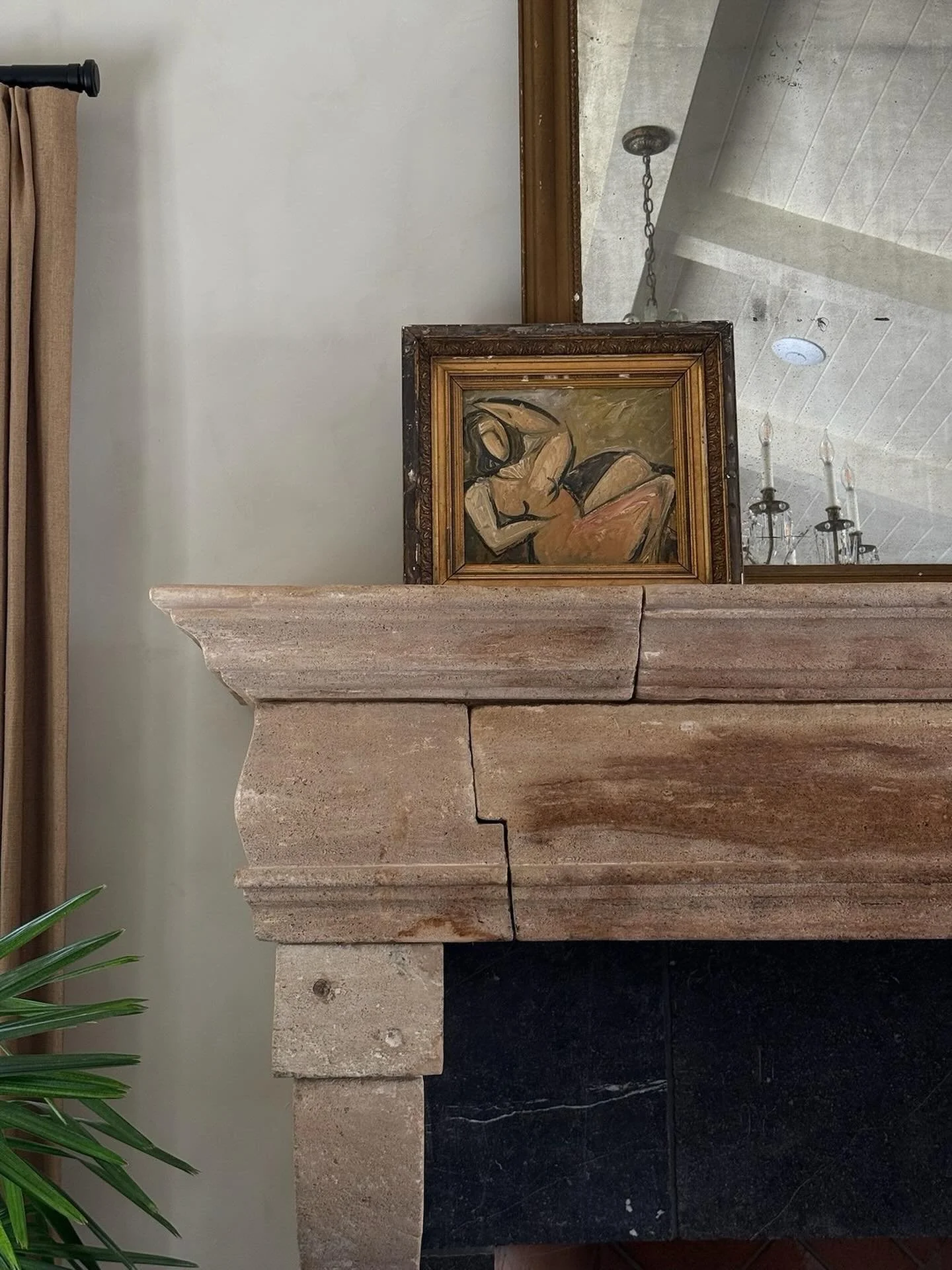 Like a garnish on a well-aged spirit, every detail on this mantle is layered with intention. Between the portrait painting and the gilded French mirror, this scene hums with character, patina, and quiet history. Stay tuned for the full room reveal.