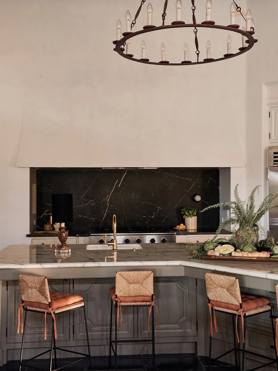 Kitchen island moments&hellip;

1. A Mediterranean villa kitchen layered in warm tones, worn stone flooring, and all the ingredients for a long evening gathered around the island &mdash; conveniently attached to the best &ldquo;bar&rdquo; in town.
Th