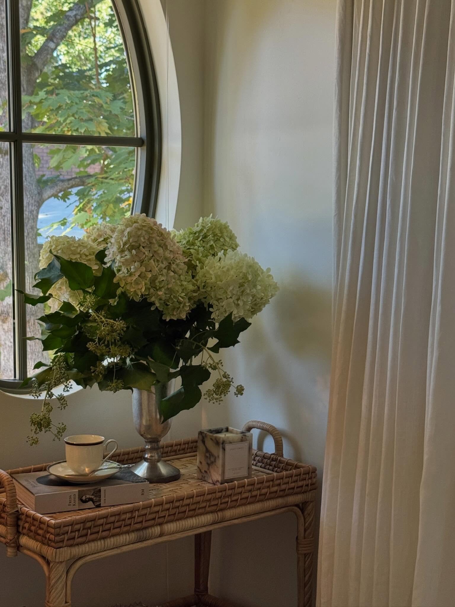 A gentle reminder that your nightstand doesn&rsquo;t have to be a nightstand.
Exhibit A: An unexpected rattan bar cart. Oversized florals. A vintage piece collected along the way. Some of our favorite bedside moments come from trading the expected fo