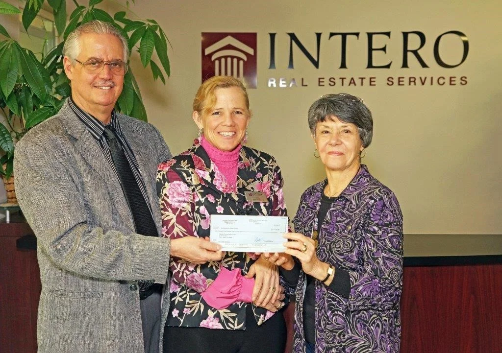John and Edie Miller present check to Cathy Fagan of the Nevada County Diaper Project