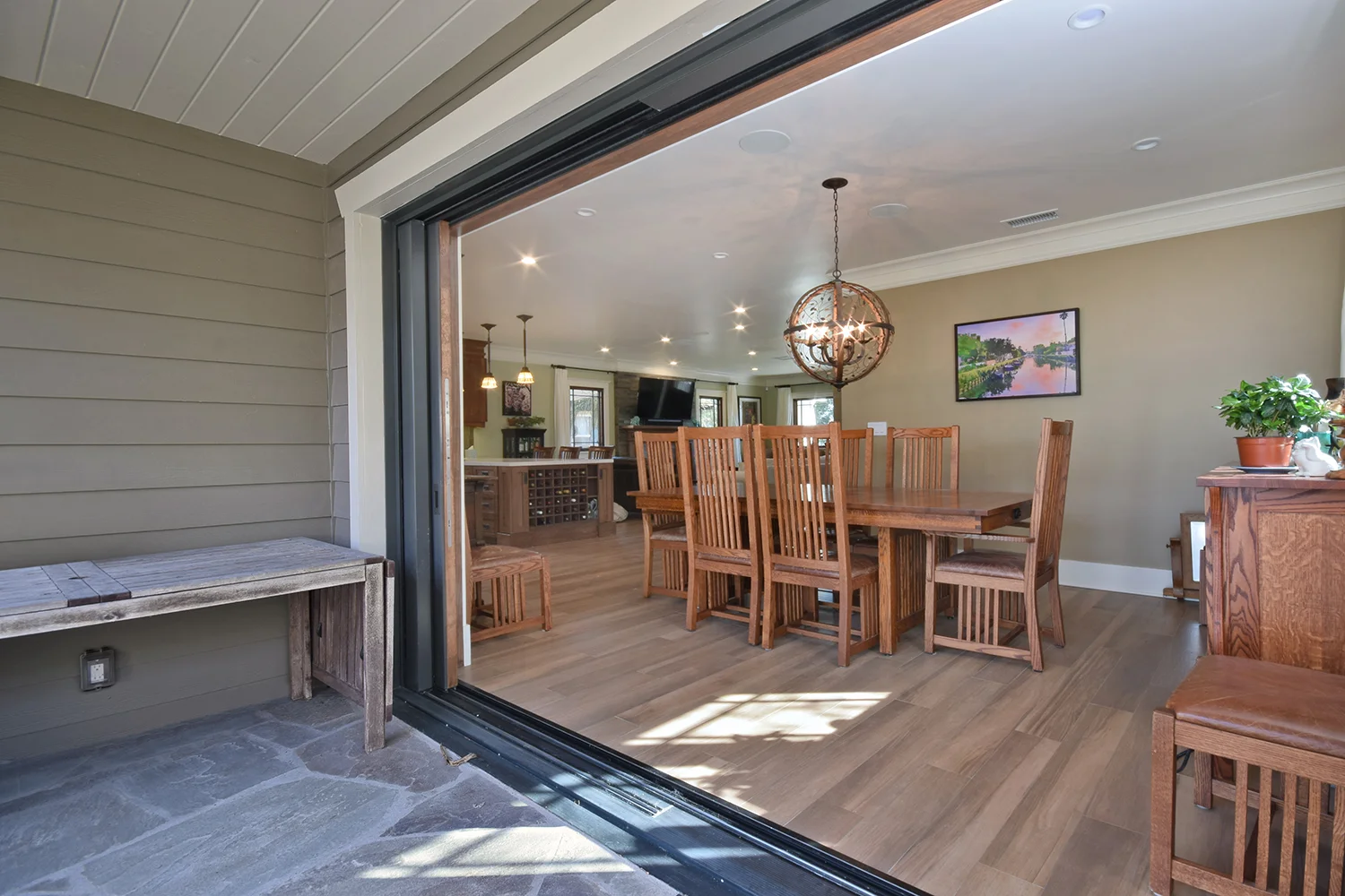 The functionality of the pocket sliding doors gives a modern twist to the Craftsman style. A way to connect the indoor and outdoor environment with the option for complete privacy or openness, all while sacrificing zero space for the actual doors.