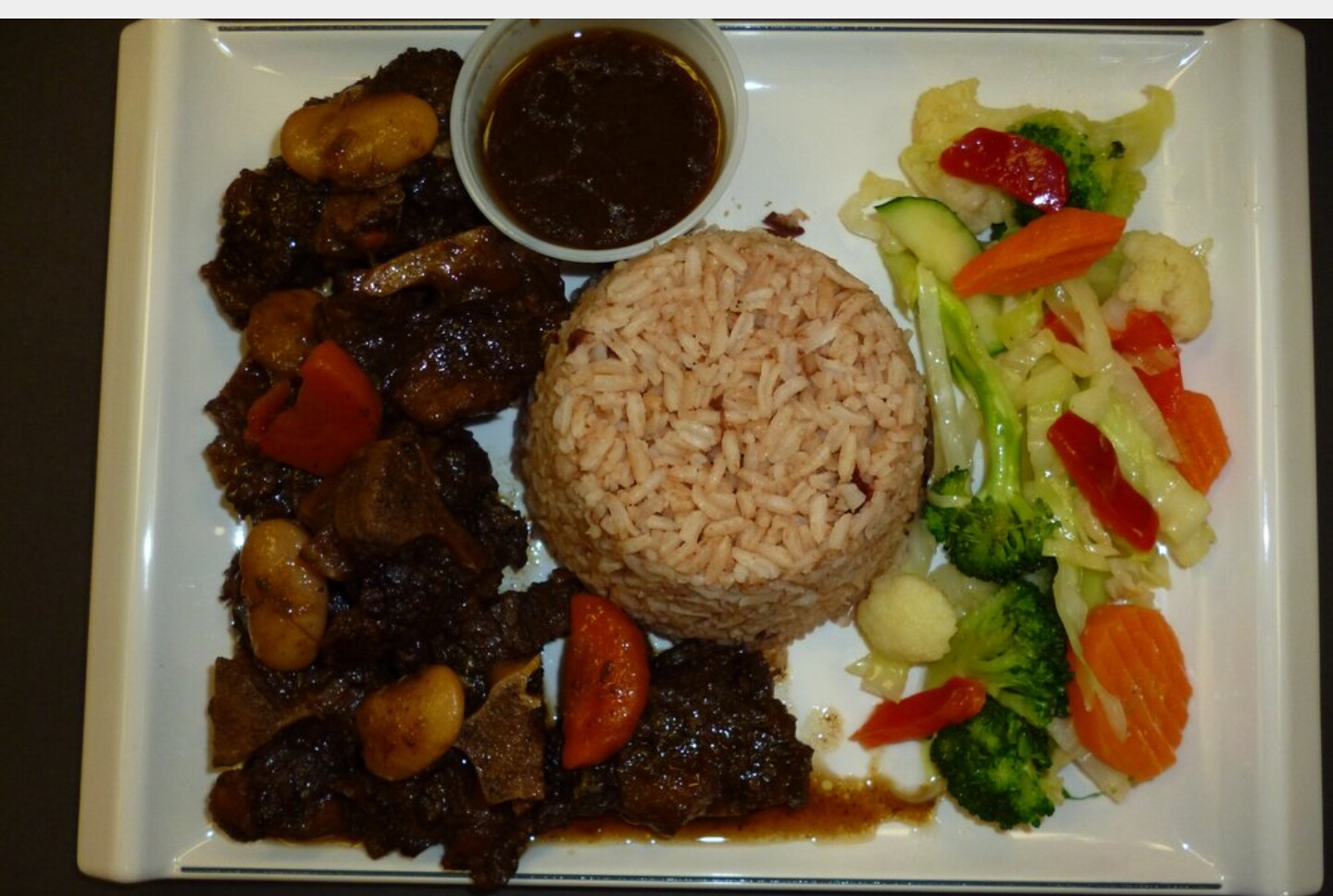Oxtail with rice & peas