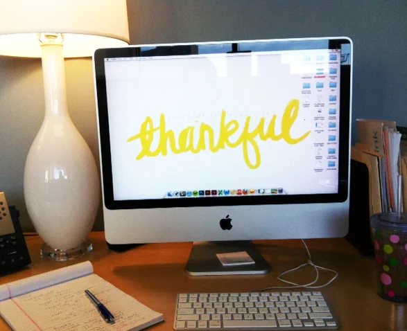 Lovin’ my cute desk and my November wallpaper . It is an accurate description of how I feel about my new job.