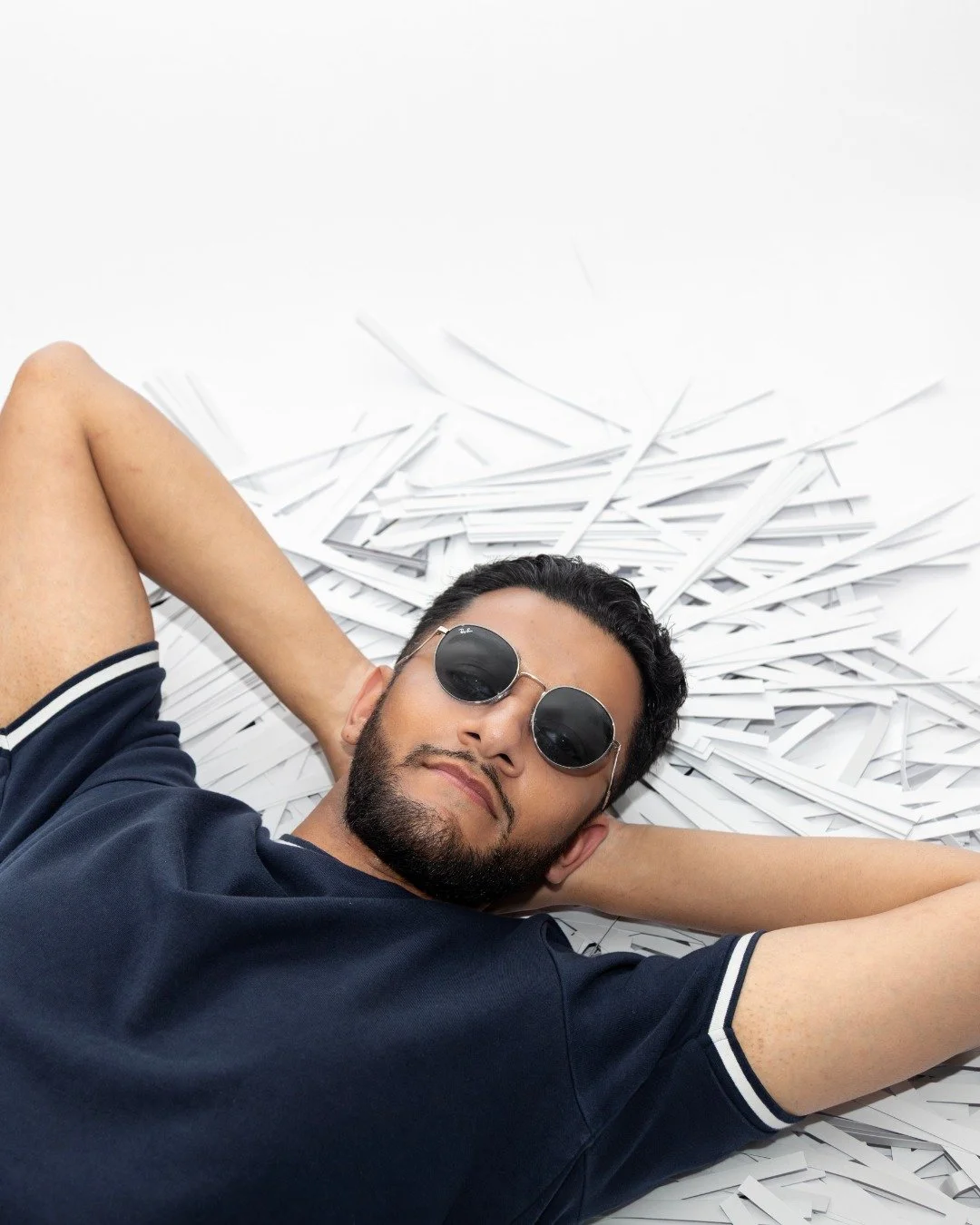 When Isa isn&rsquo;t running around the print studio&hellip; he&rsquo;s finding a soft spot to relax - like the pile of paper shreds. 😎

Csilla&rsquo;s behind the camera, making sure every shot - from quick office shoots like this to full on campaig