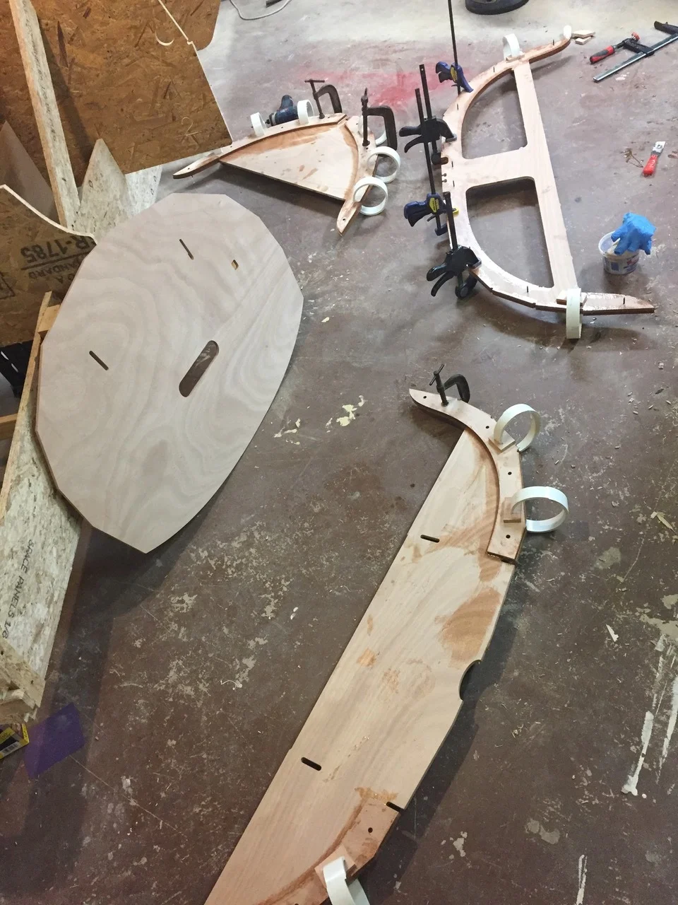 A batch of CIY parts prepared: the bulkhead frames are glued. You can make out the alignment holes precut into those parts. 