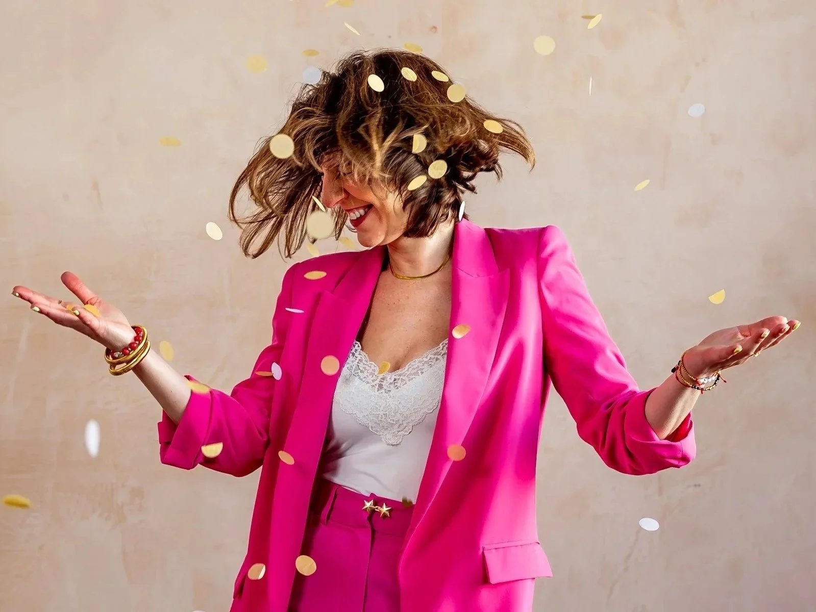 woman celebrating with confetti