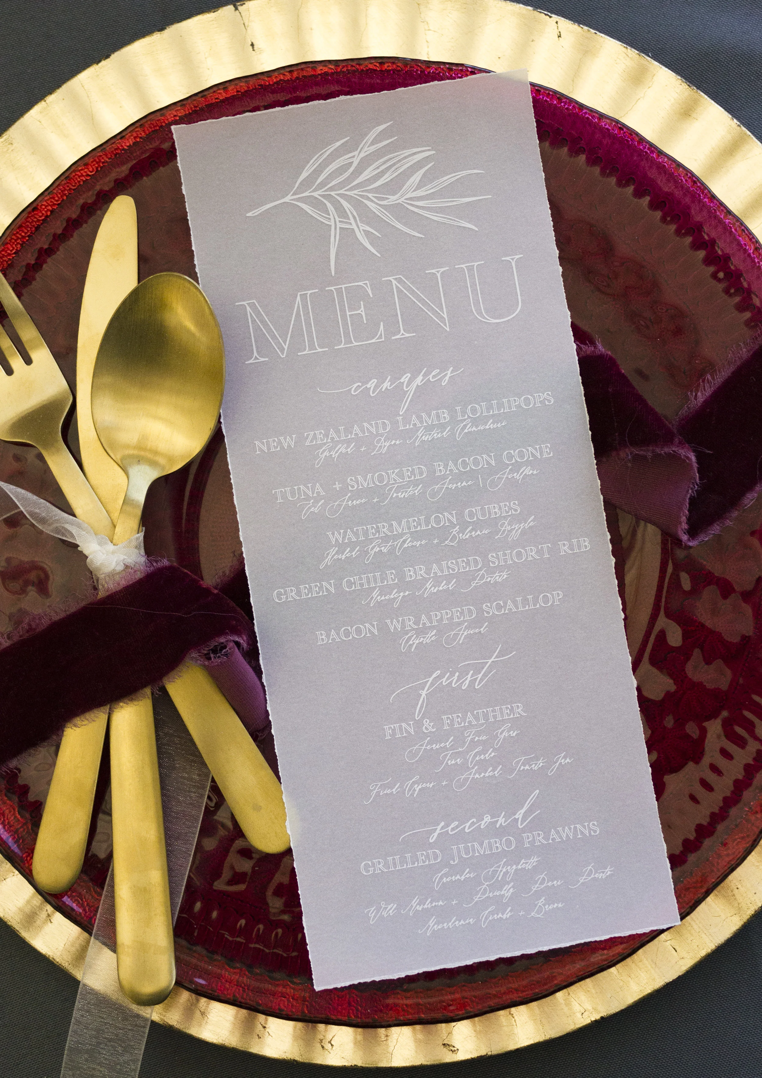 White ink and a deckled edge makes a statement.