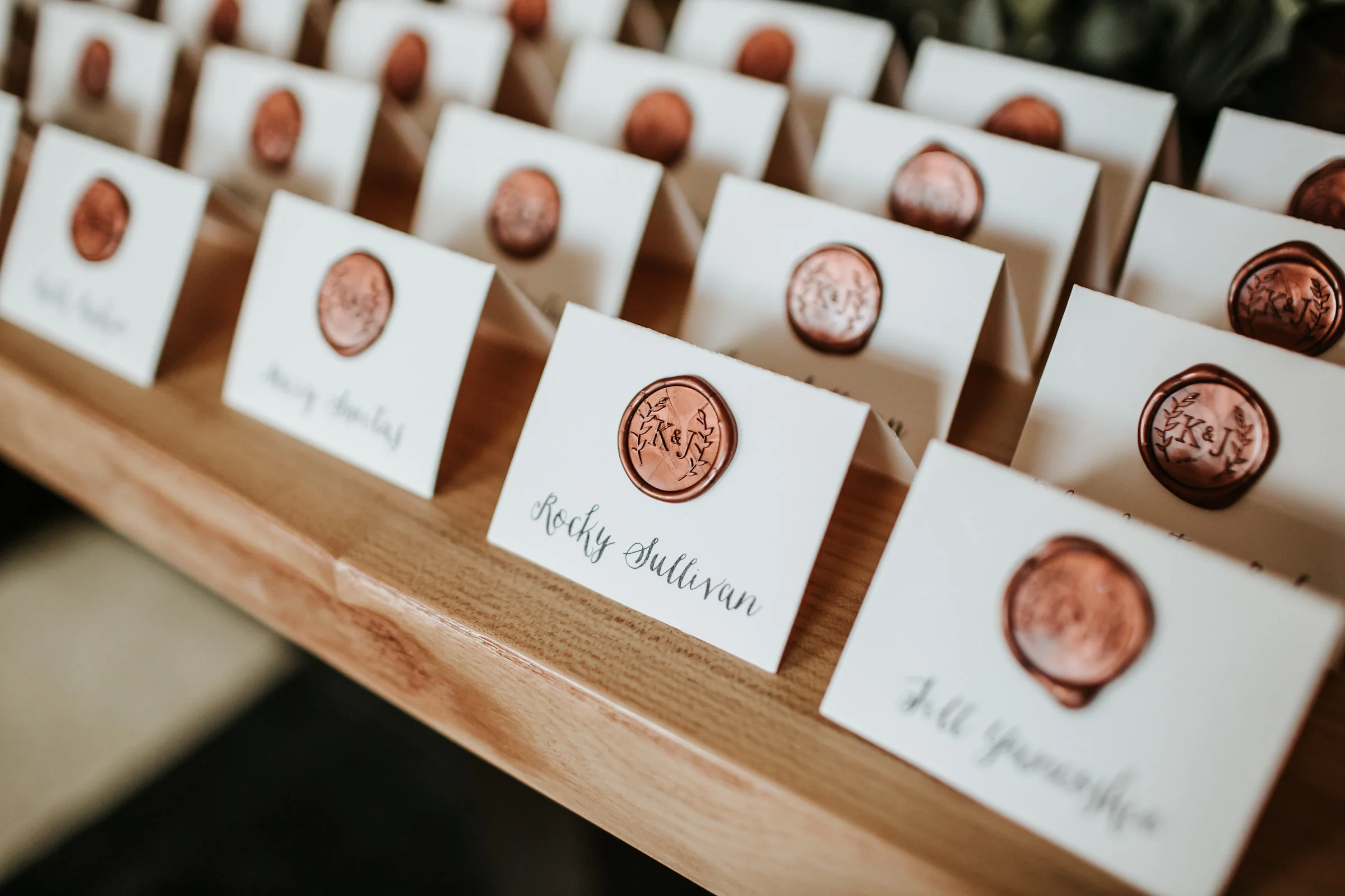 These place cards for Jamie + Kara’s wedding were such a hit - and one of our most asked about place card designs! Photo by the amazing Emily Joanne Photography .