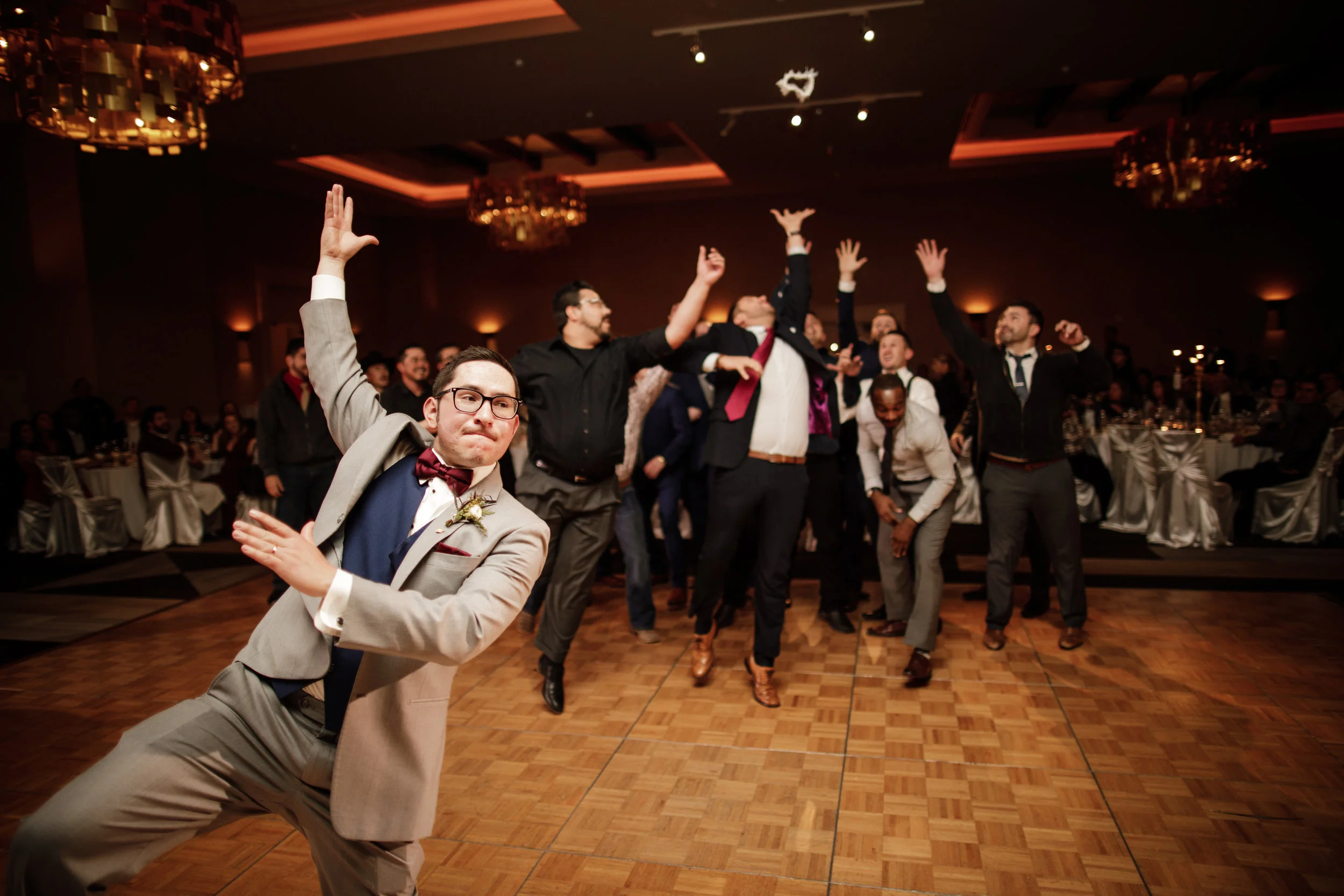We just love a good “groom throwing the garter” shot, don’t you?