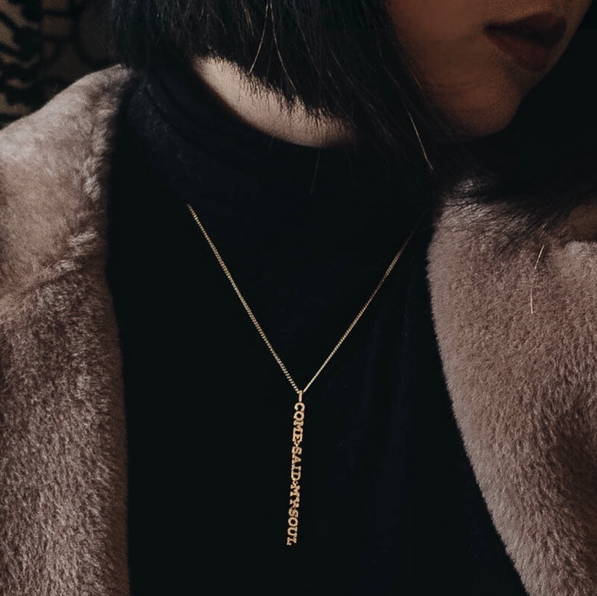 Maggie Zhu wears her piece against a black top for added statement. See her post here