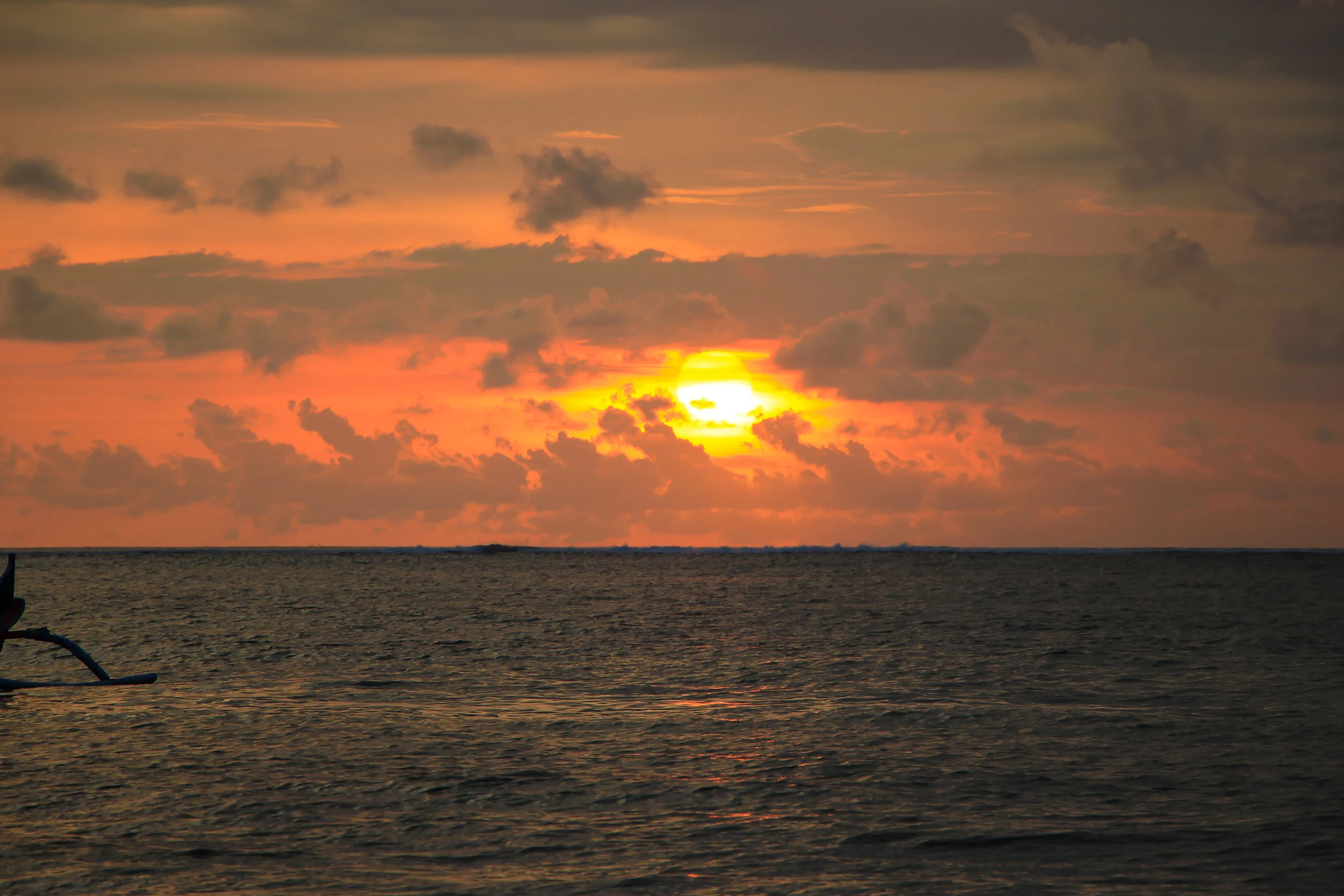 sunset, sky, sun, fishing boat, Bali, Indonesia, Asia | DoLessGetMoreDone.com |