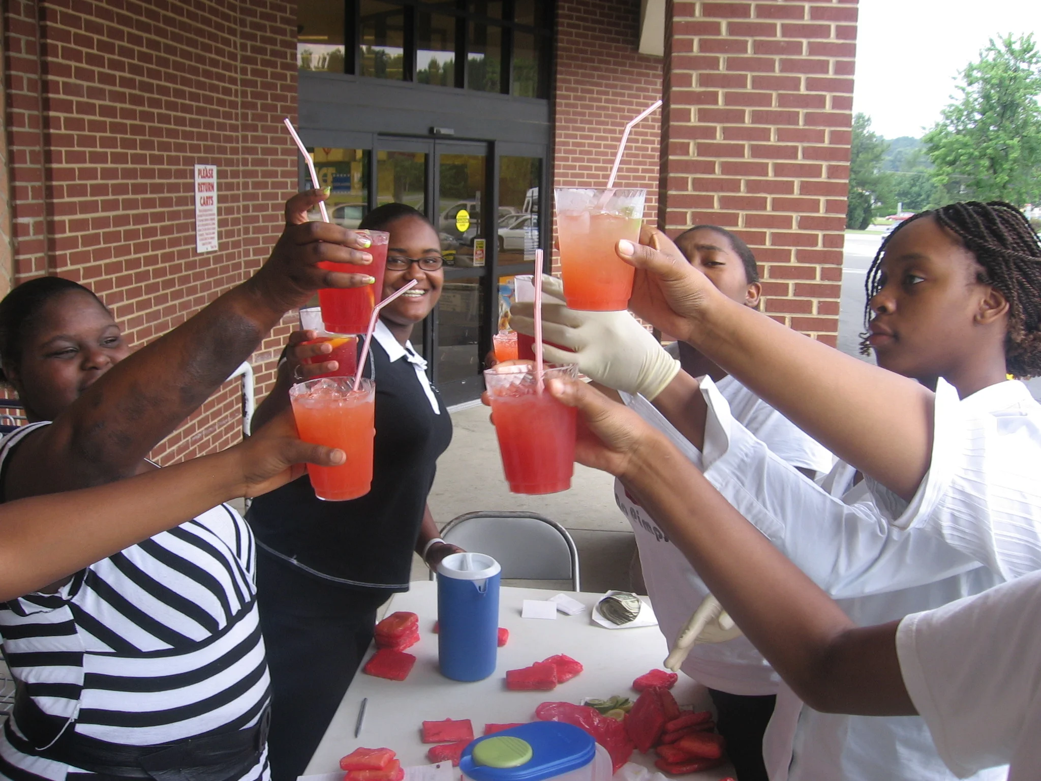 our young entrepreneurs cheering to a successful lemonade stand...how cool & refreshing!!!